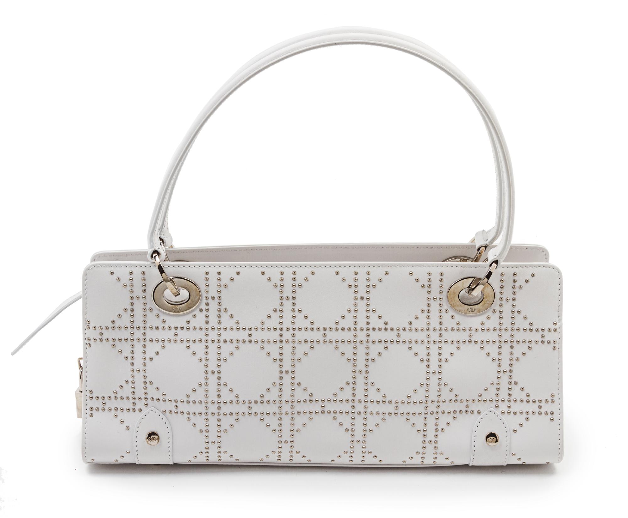 A Christian Dior Lady Dior White Leather Studded Tote, 12 1/2 x 5 x 4 inches.