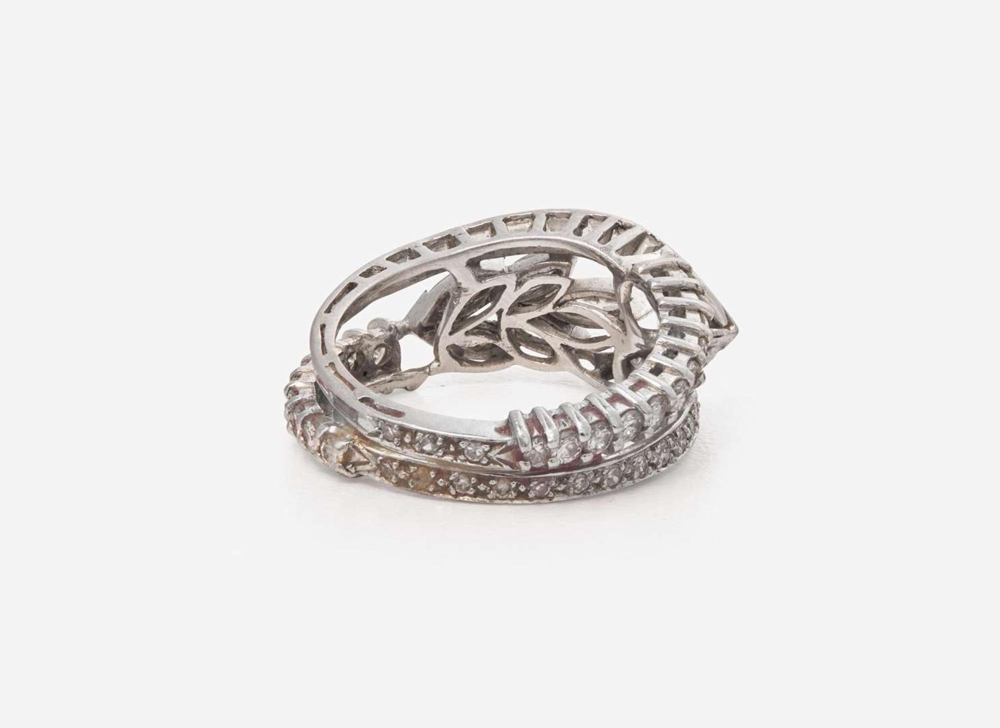 A Ladies Platinum and Diamond Ring