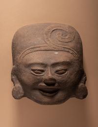 A Veracruz Head and Tlatilco Head