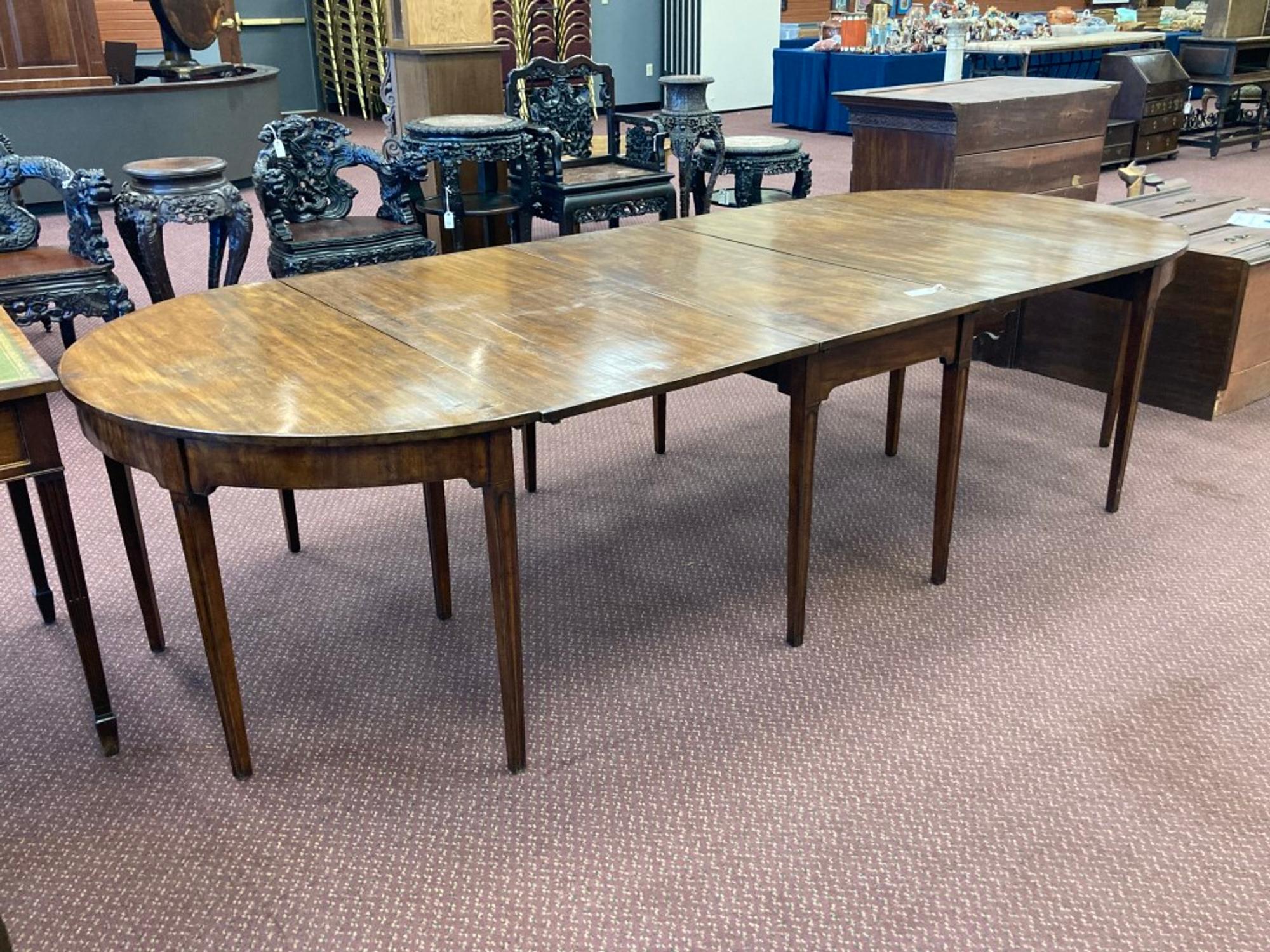 An English Mahogany Dining Table