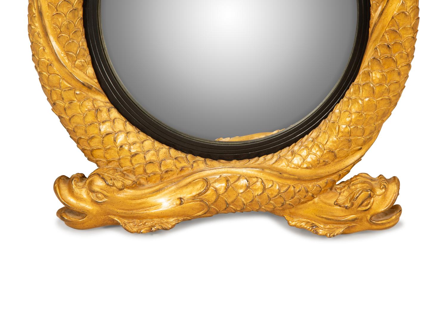 A Regency Style Carved Giltwood Entwined Dolphin Framed Convex Mirror — 20TH CENTURY