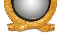 A Regency Style Carved Giltwood Entwined Dolphin Framed Convex Mirror — 20TH CENTURY