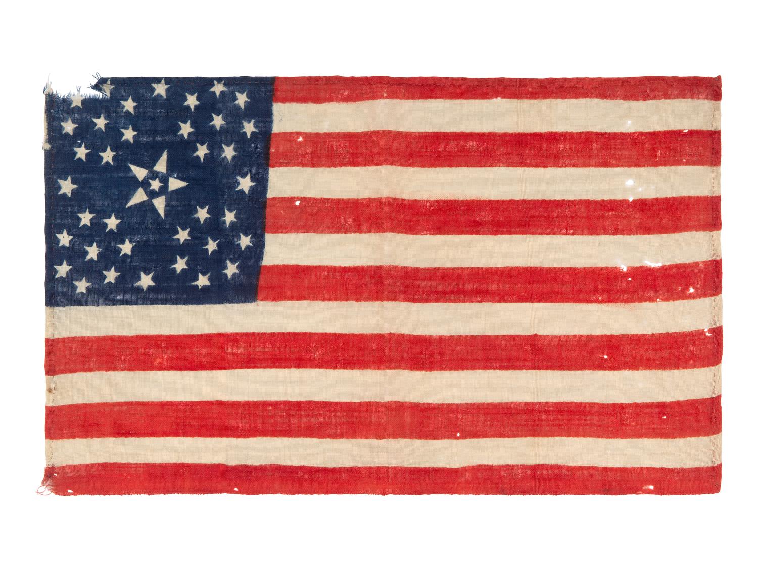 [FLAGS]. 38-star American parade flag with floral star pattern. Ca 1876-1889.