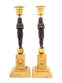 A Pair of French Egyptian Revival Bronze and Marble Candlesticks
