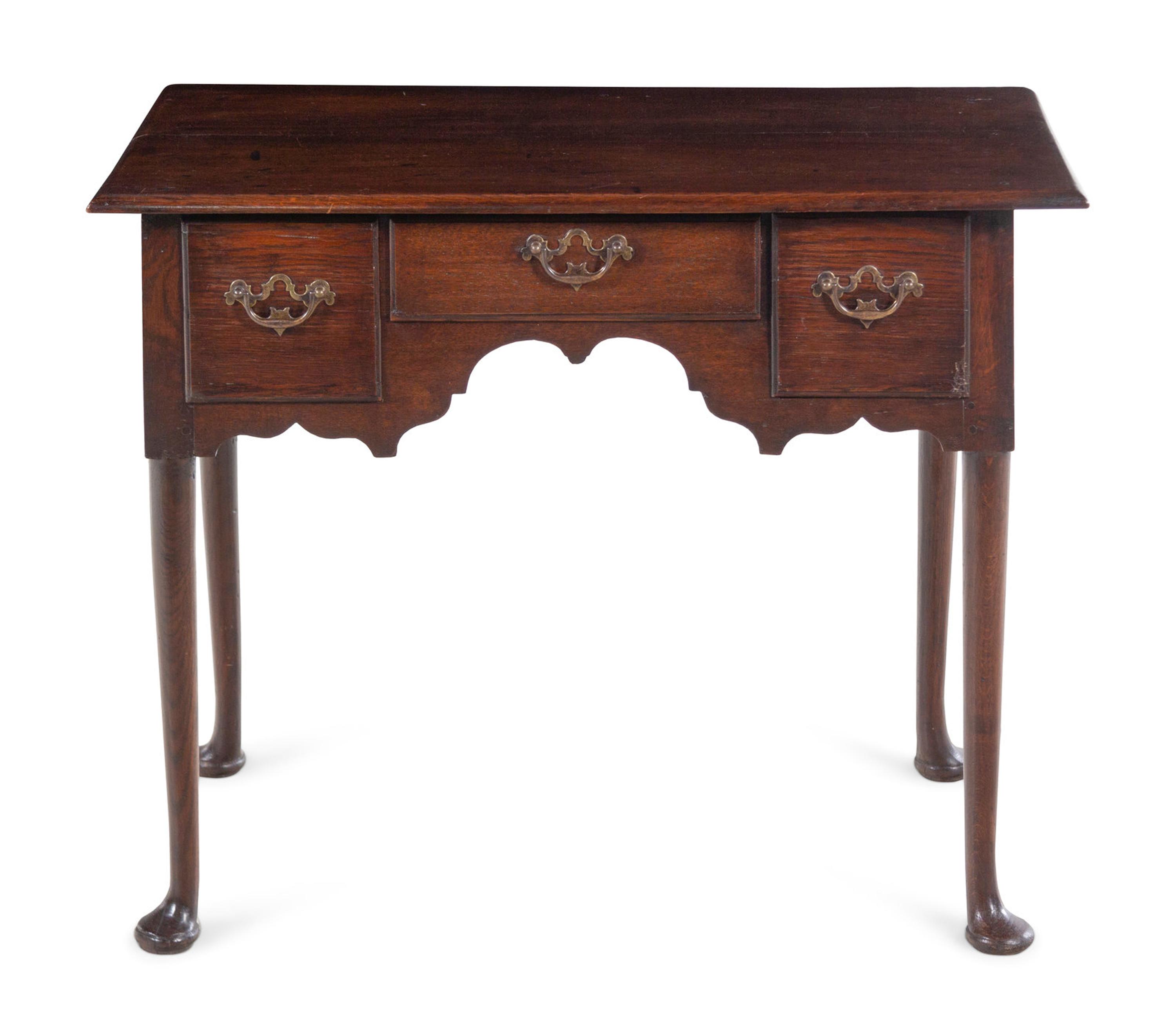 A Queen Anne Carved Oak Dressing Table