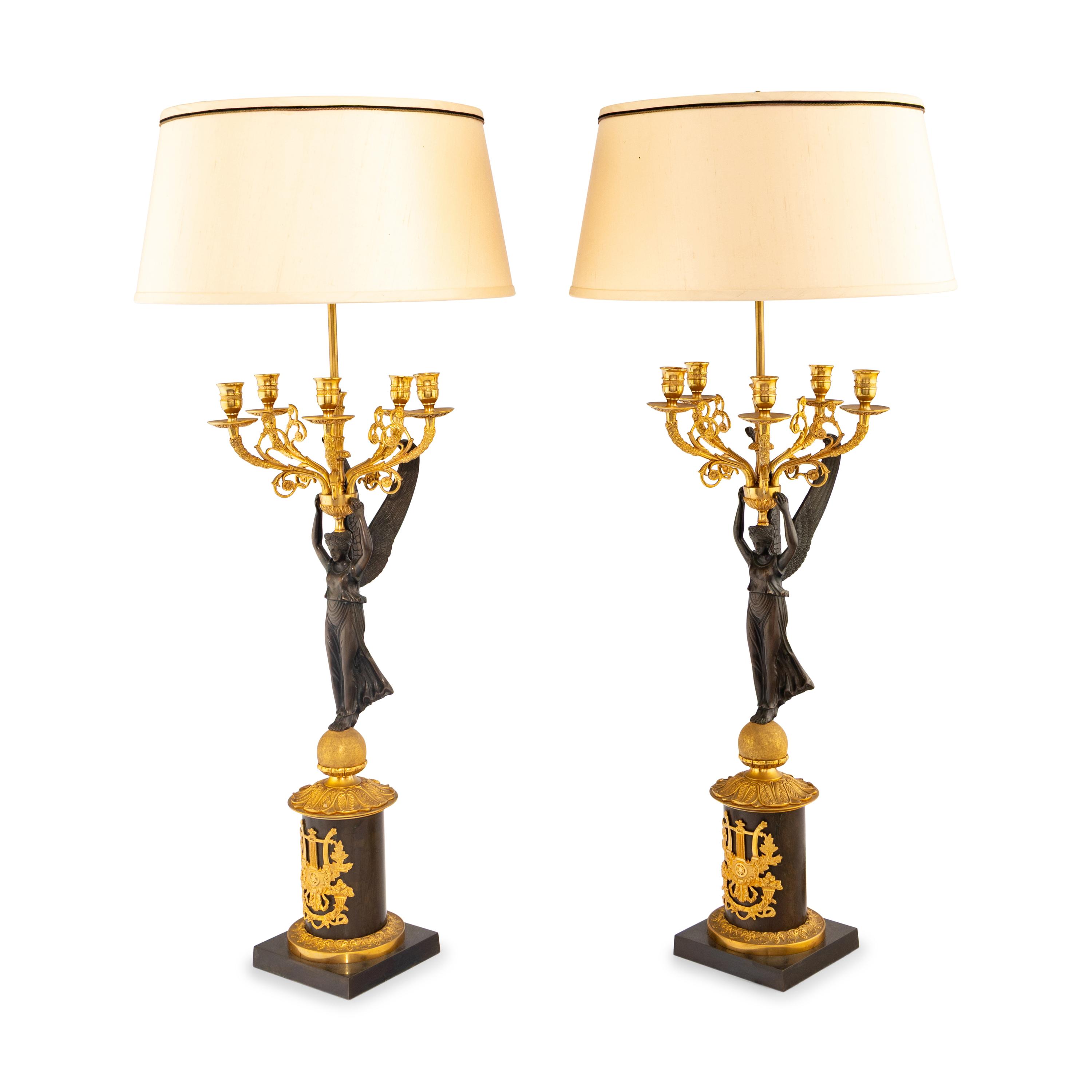A Pair of Empire Style Gilt and Patinated Bronze Candelabra Mounted as Lamps