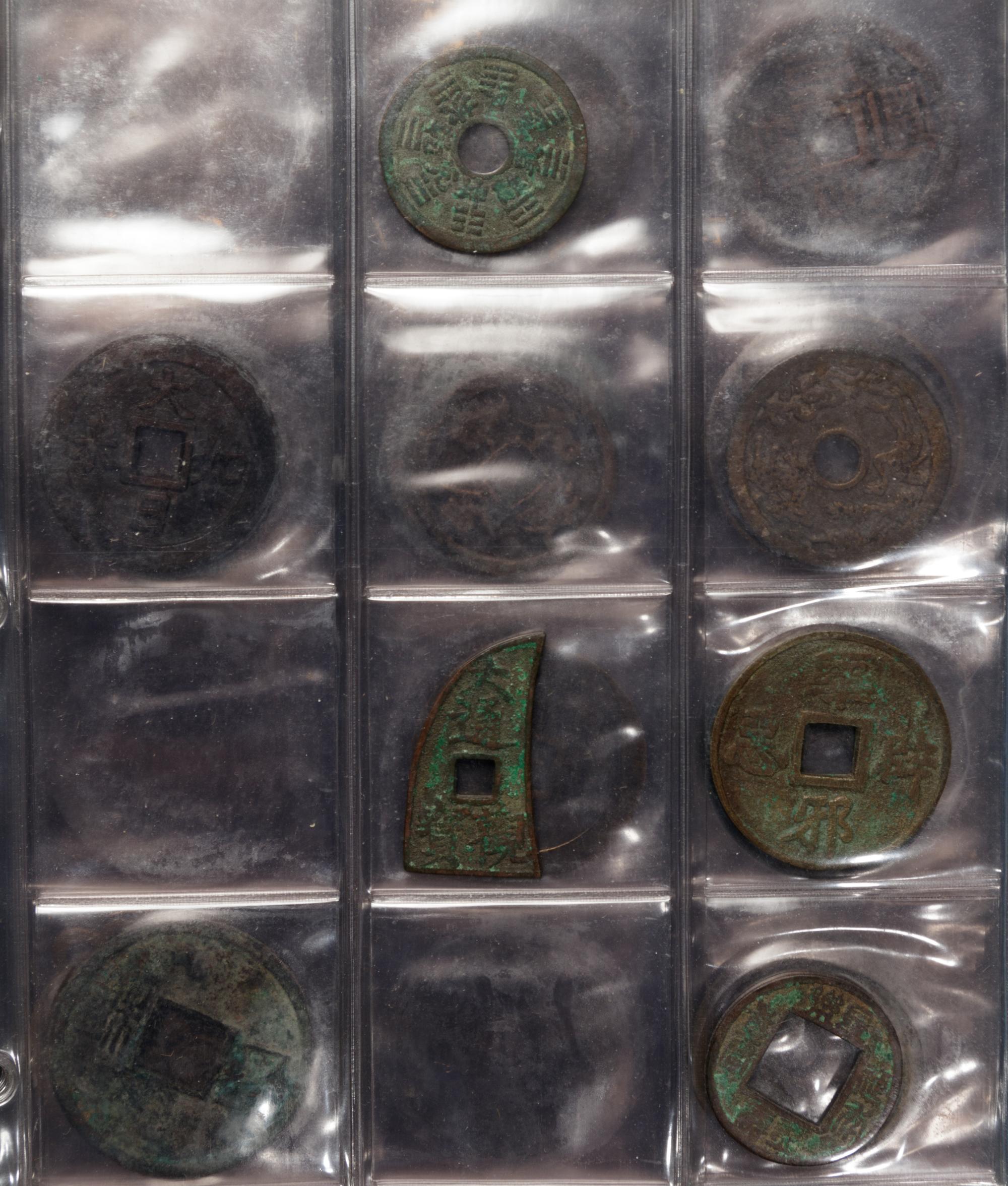 A Large Collection of Chinese Coins and Pendants