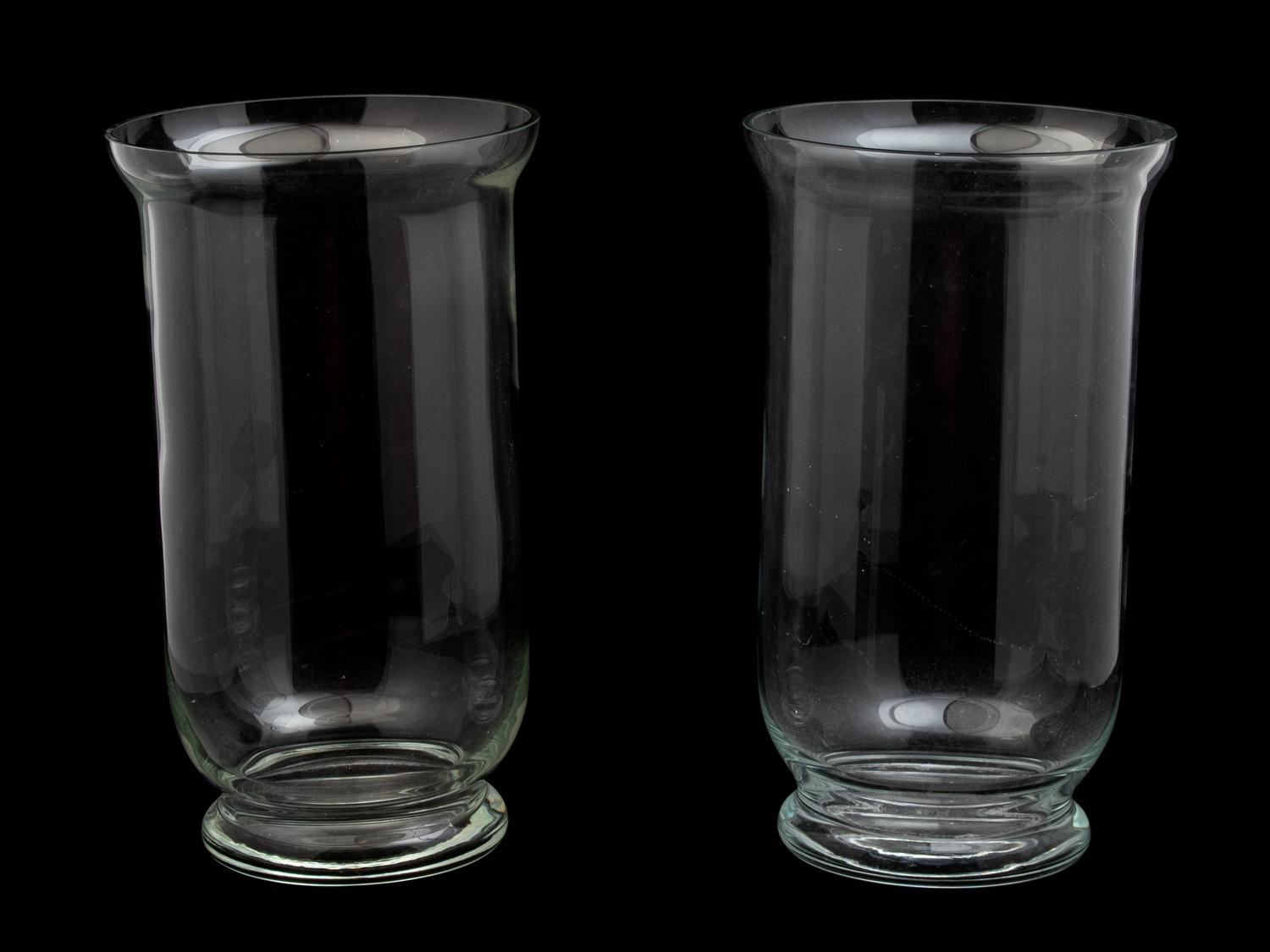 A Pair of Hurricane Glass Vases Height 20 inches. — 20TH CENTURY