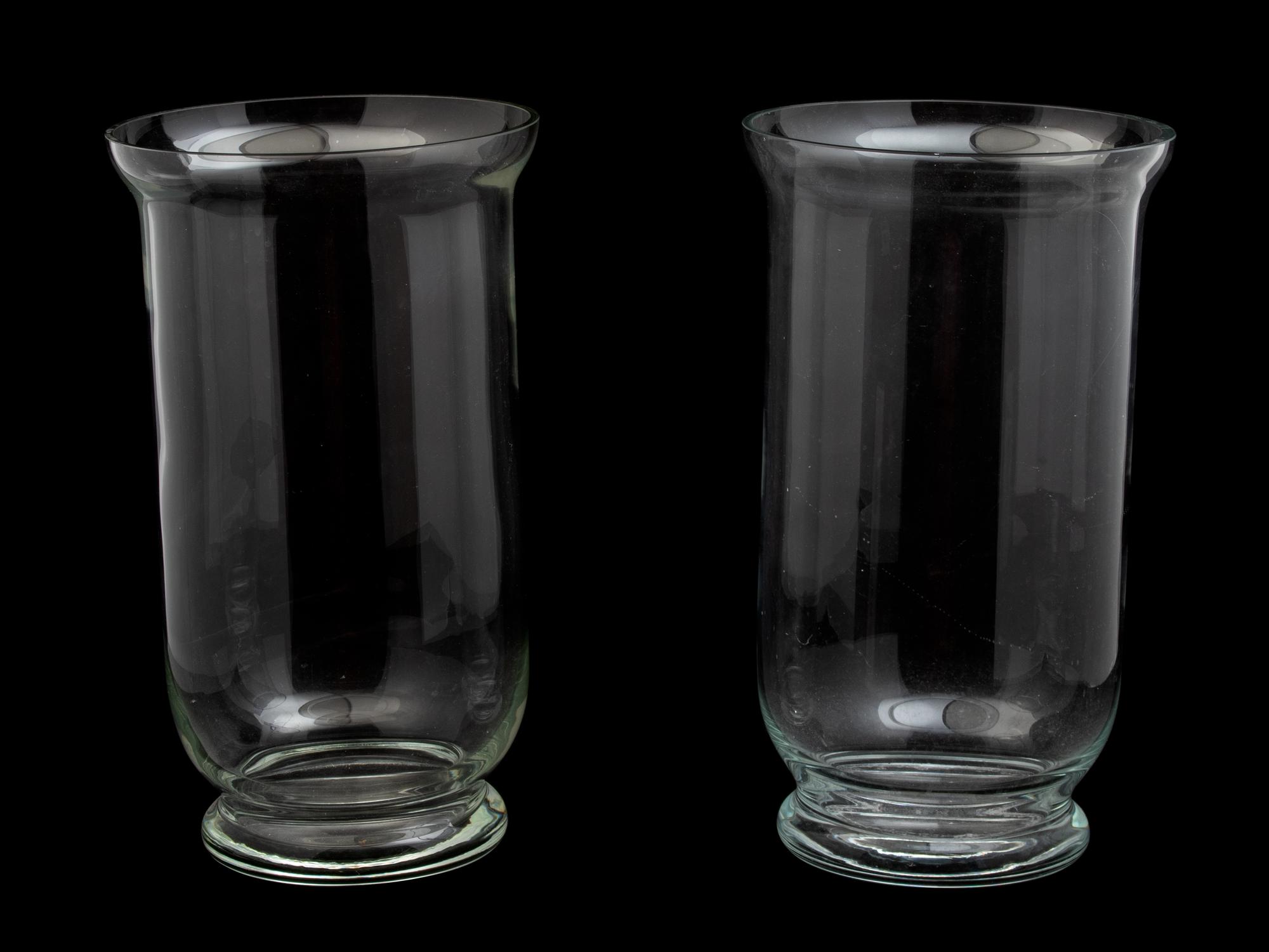 A Pair of Hurricane Glass Vases Height 20 inches. — 20TH CENTURY