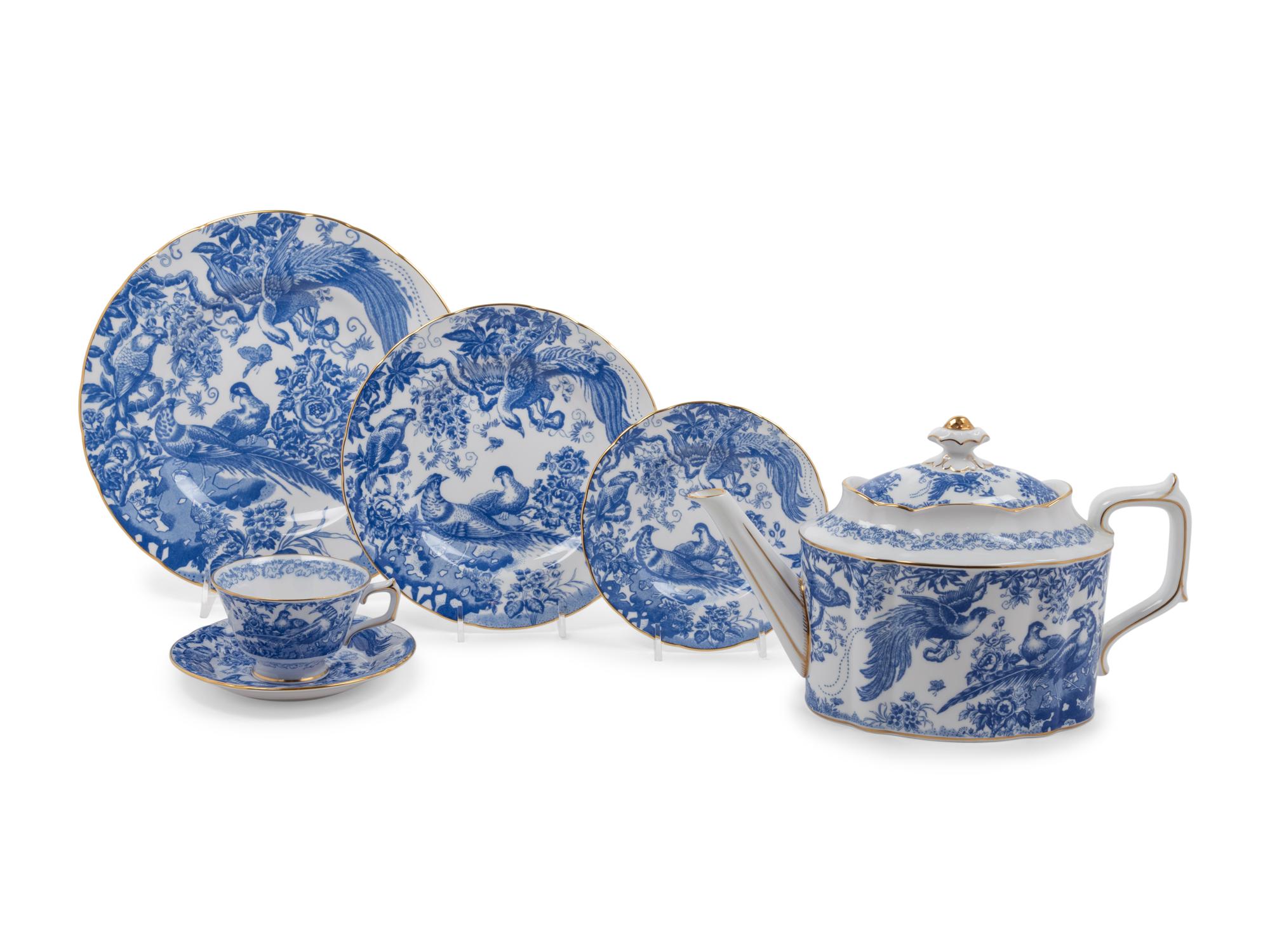 A Royal Crown Derby Porcelain Blue Aves Dinner Service
