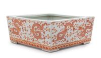 An Iron Red and Gilt Decorated Porcelain Jardiniere Height 6 x width 14 x depth 13 3/4 inches.