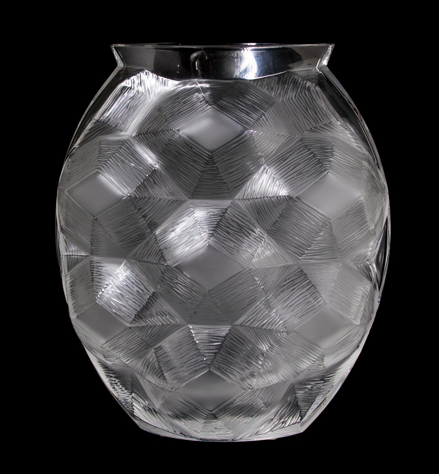 A Lalique Molded and Frosted Glass Vase, Height 10 1/2 inches.