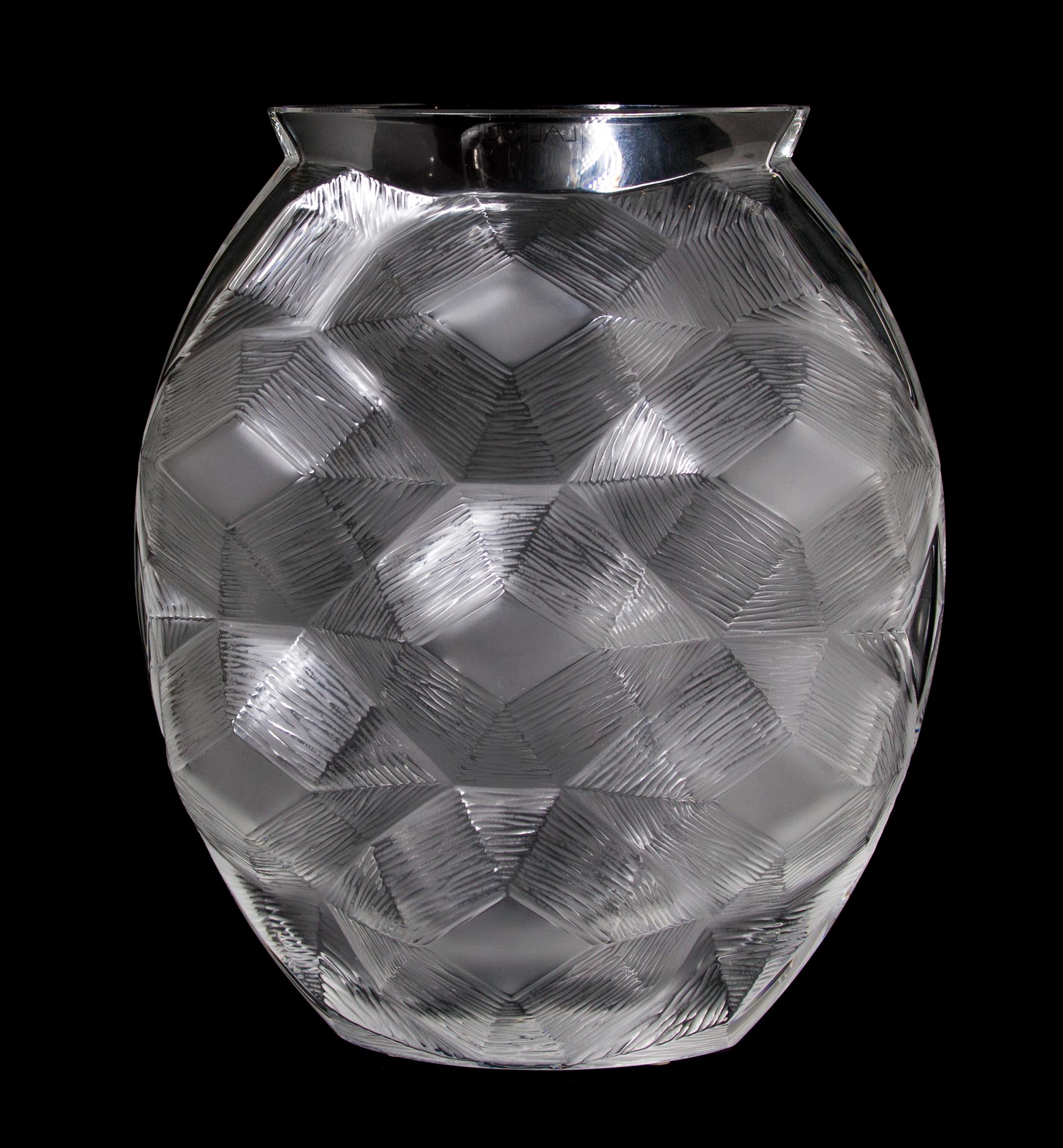 A Lalique Molded and Frosted Glass Vase, Height 10 1/2 inches.