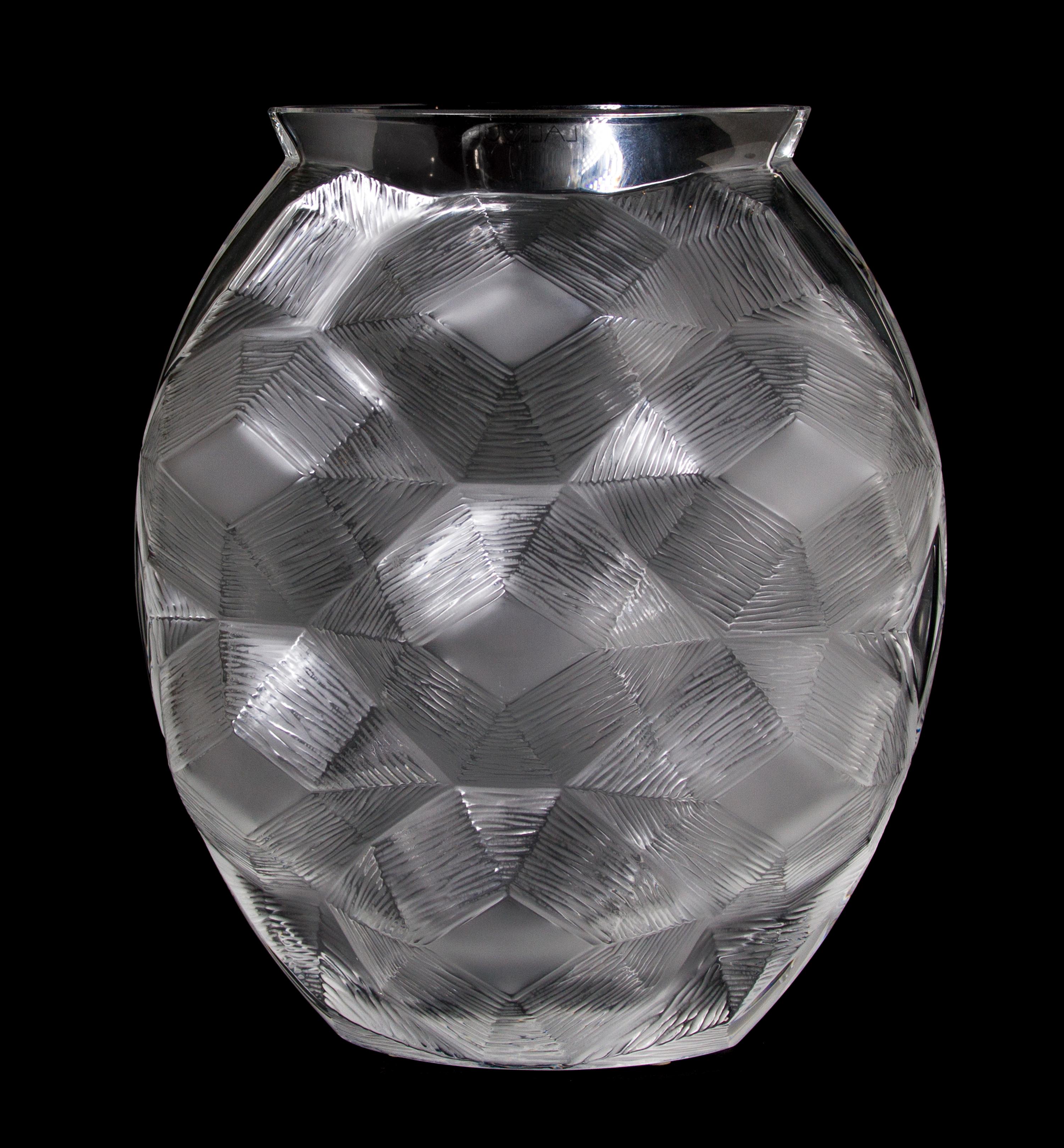 A Lalique Molded and Frosted Glass Vase, Height 10 1/2 inches.
