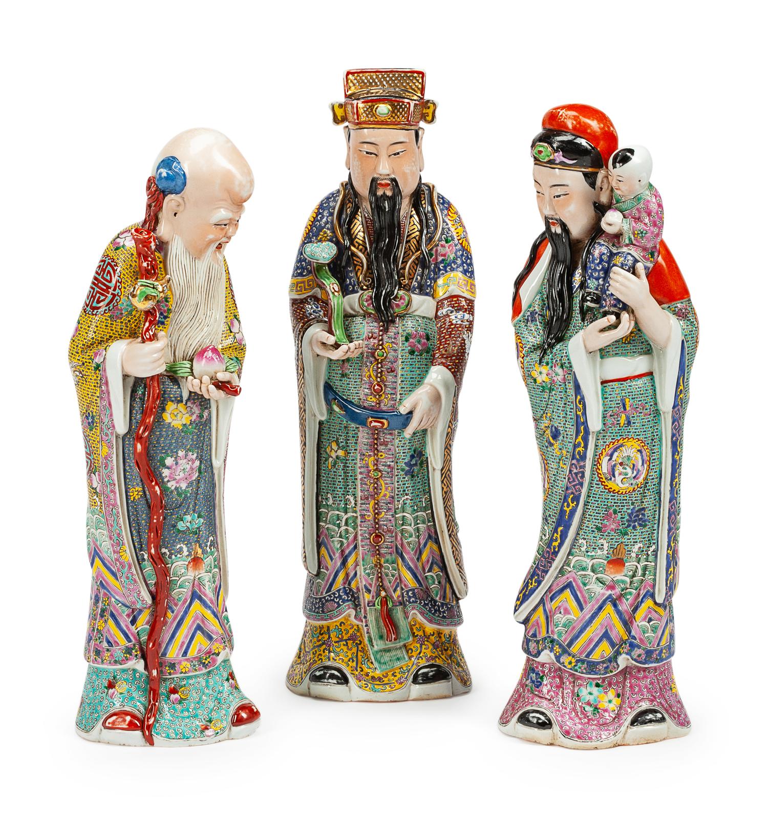 Three Chinese Porcelain Figures of Scholars