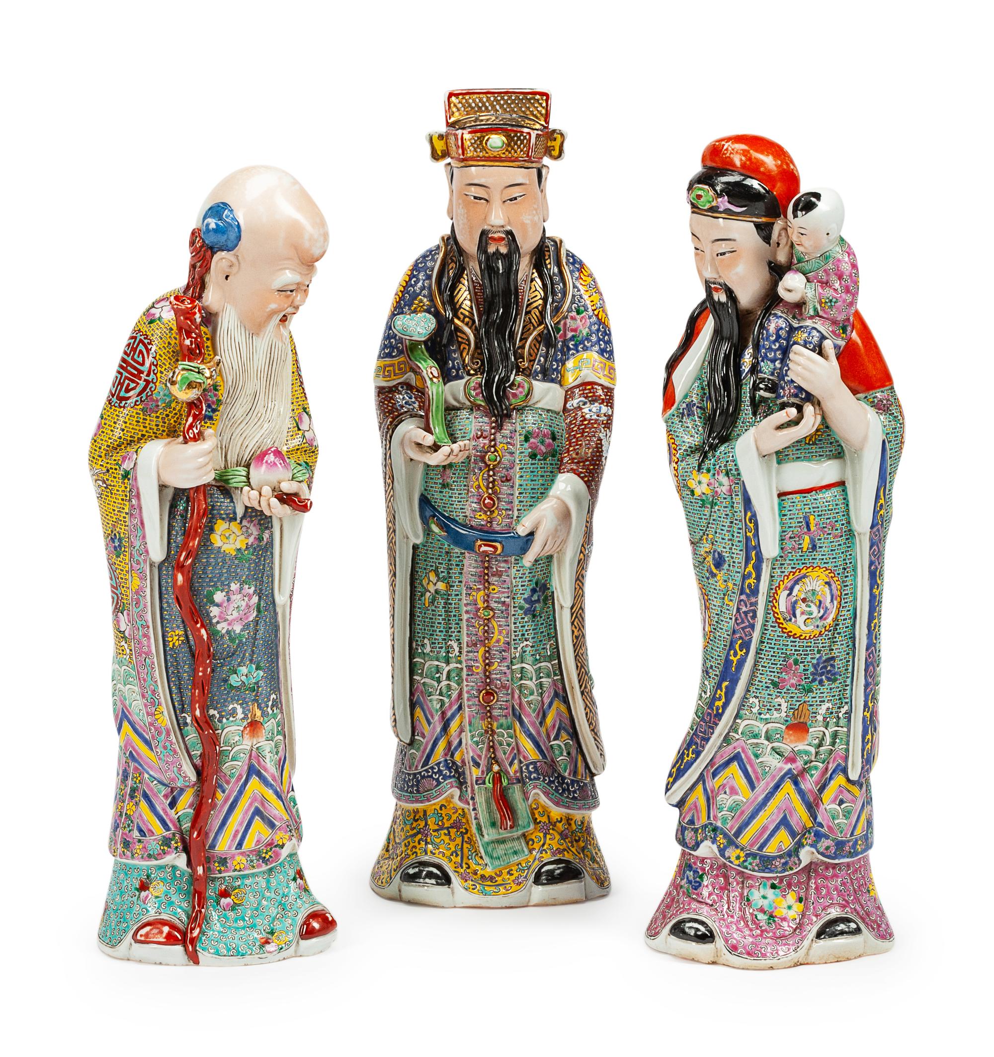 Three Chinese Porcelain Figures of Scholars