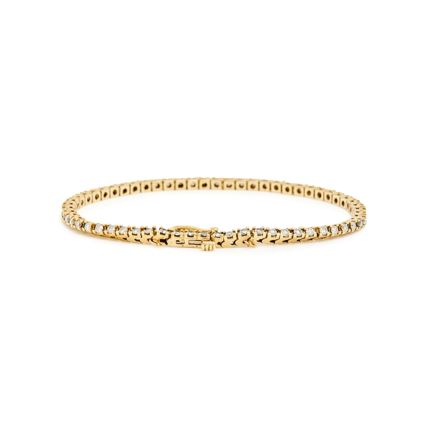 PAIR OF YELLOW GOLD AND DIAMOND LINE BRACELETS