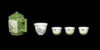 A Five-Piece Chinese Green Ground Famille Rose Porcelain Tea Set
