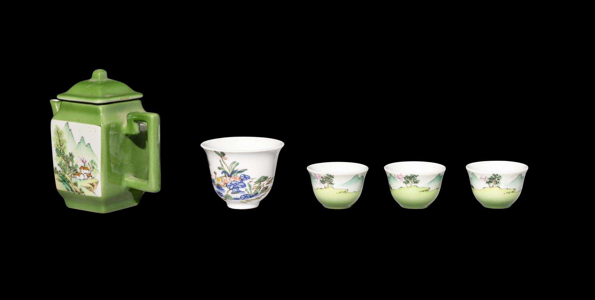 A Five-Piece Chinese Green Ground Famille Rose Porcelain Tea Set