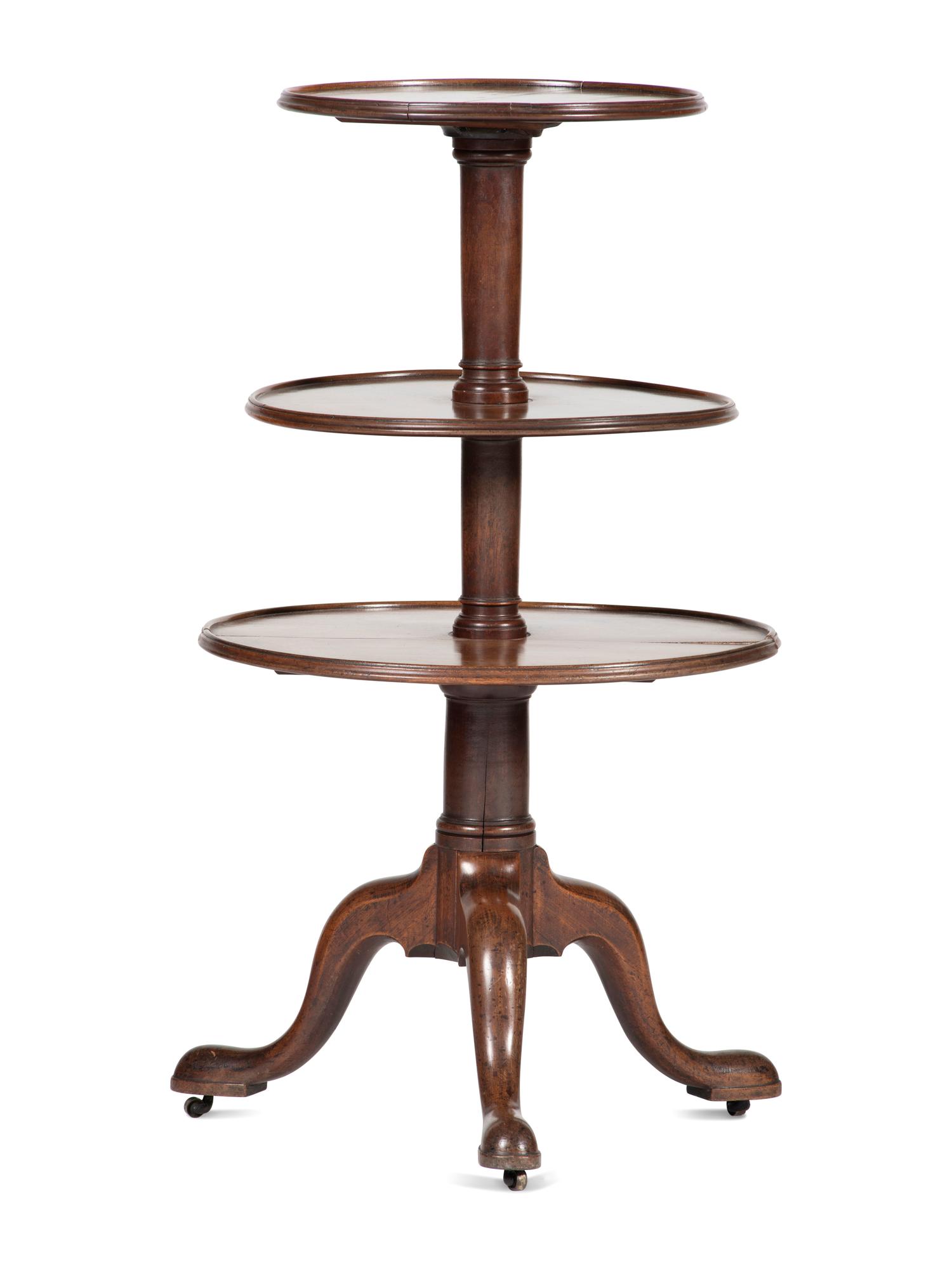 A George III Carved, Turned and Dished Walnut Three-Tier Dumbwaiter