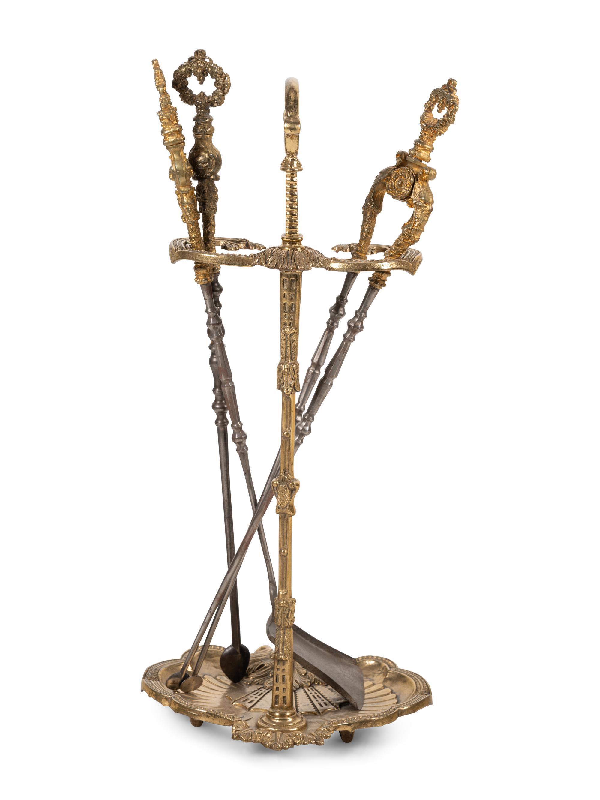 A Set of French Gilt Metal and Iron Fire Tools and Stand