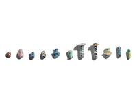 A Group of Eleven Glass Amulets and Ear Studs