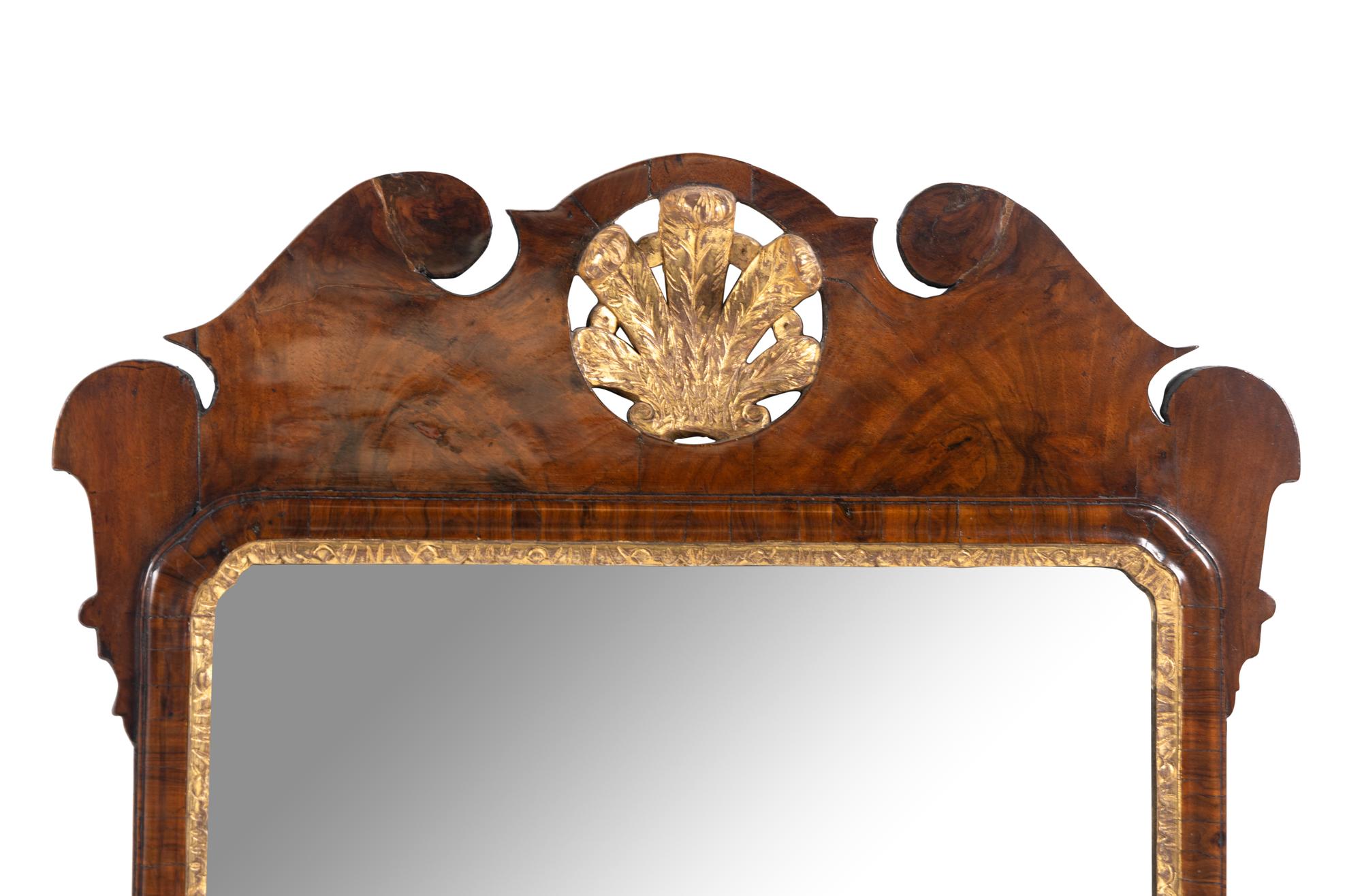A George III Parcel-Gilt Mahogany Mirror