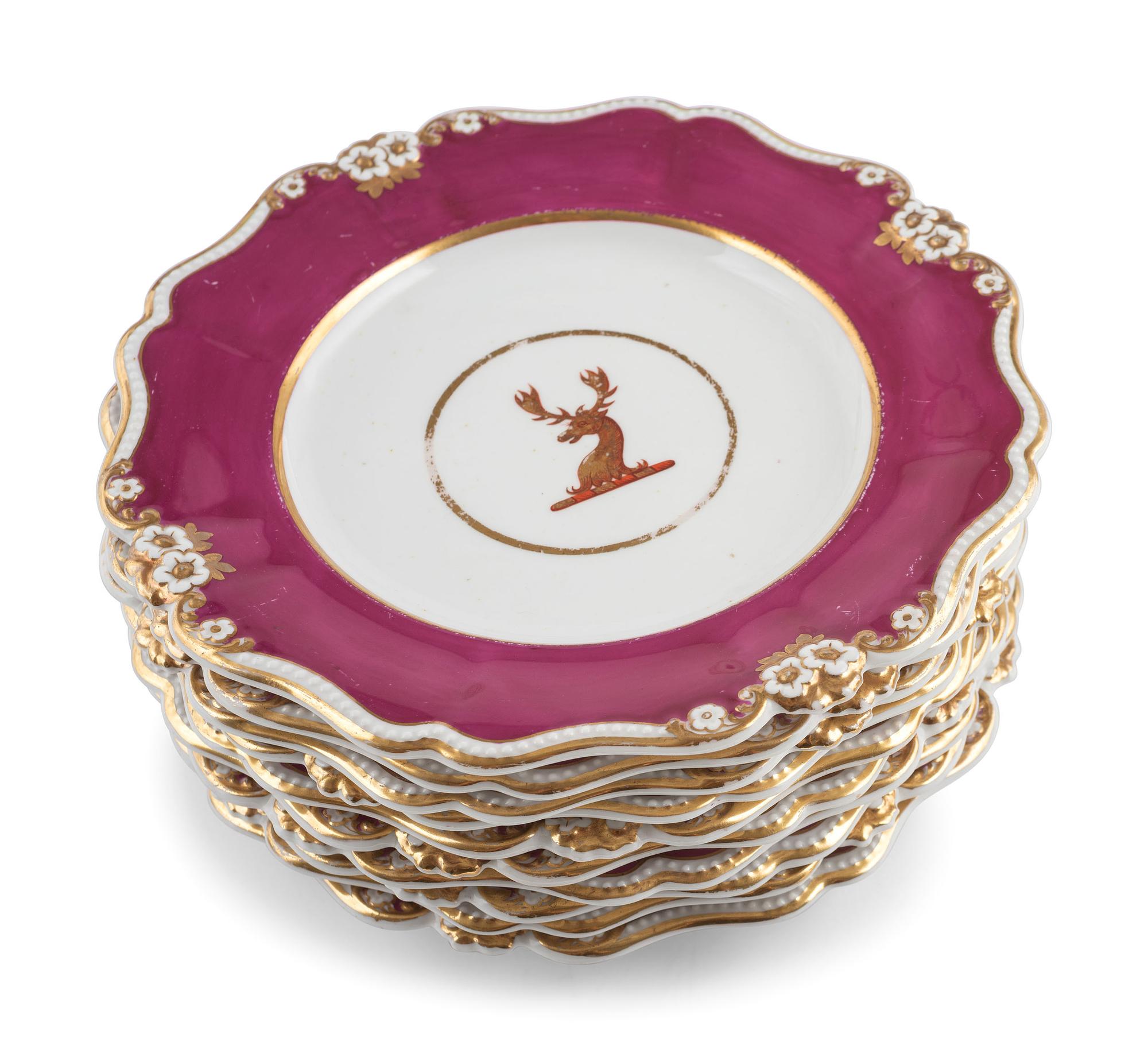 An English Parcel-Gilt and Puce Decorated Porcelain Dinner Service