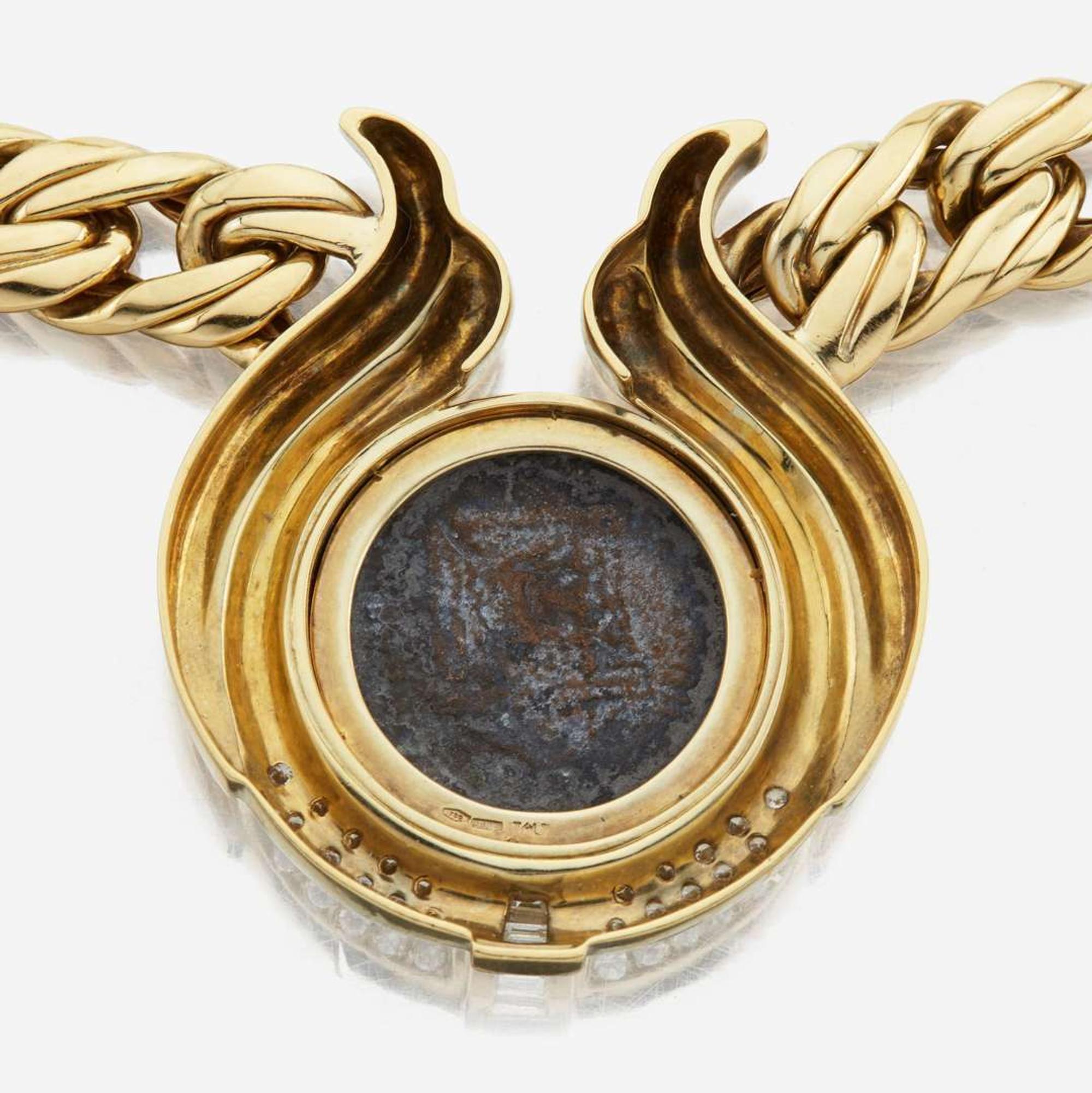 A gold, diamond, and coin necklace