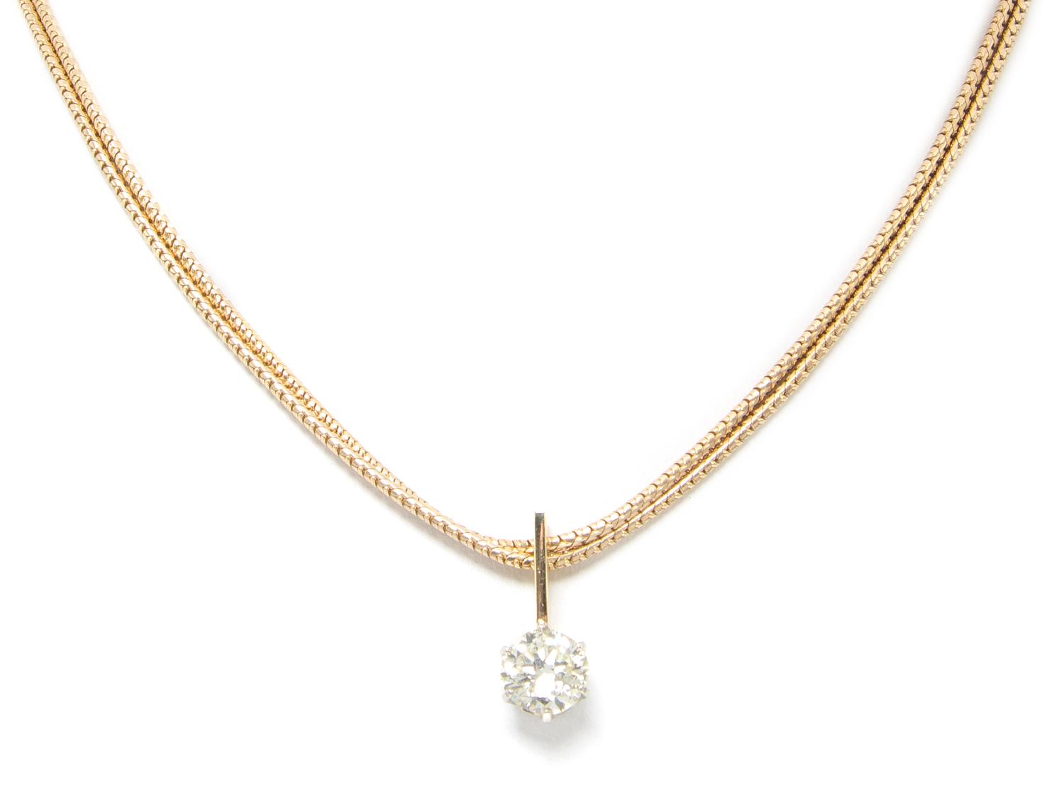 A 14 Karat Yellow Gold and Diamond Solitaire Necklace, 12.50 dwts.