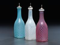Three Swirl Opalescent Glass Barber Bottles