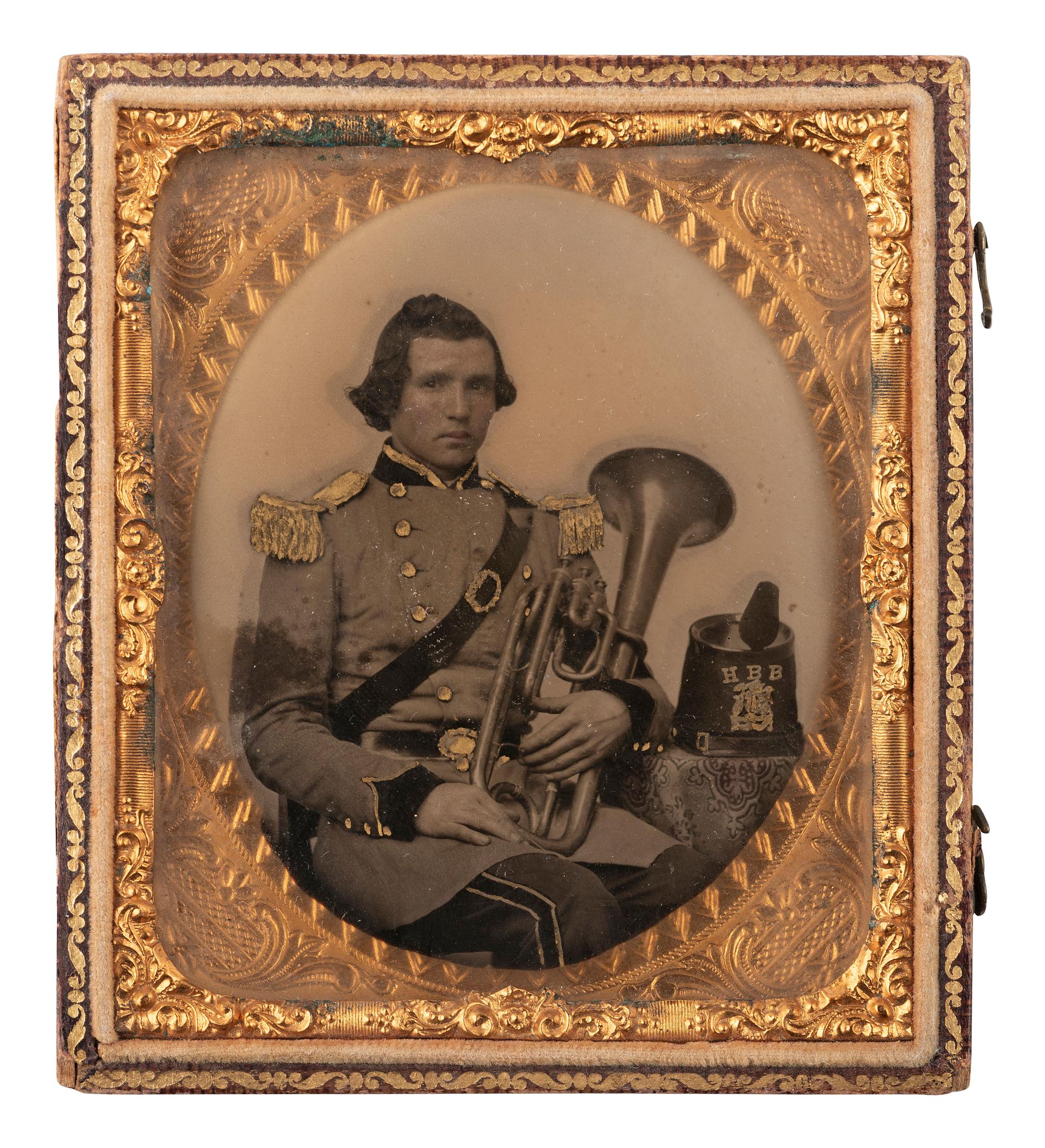 [EARLY PHOTOGRAPHY]. Sixth plate ambrotype of a brass band musician.