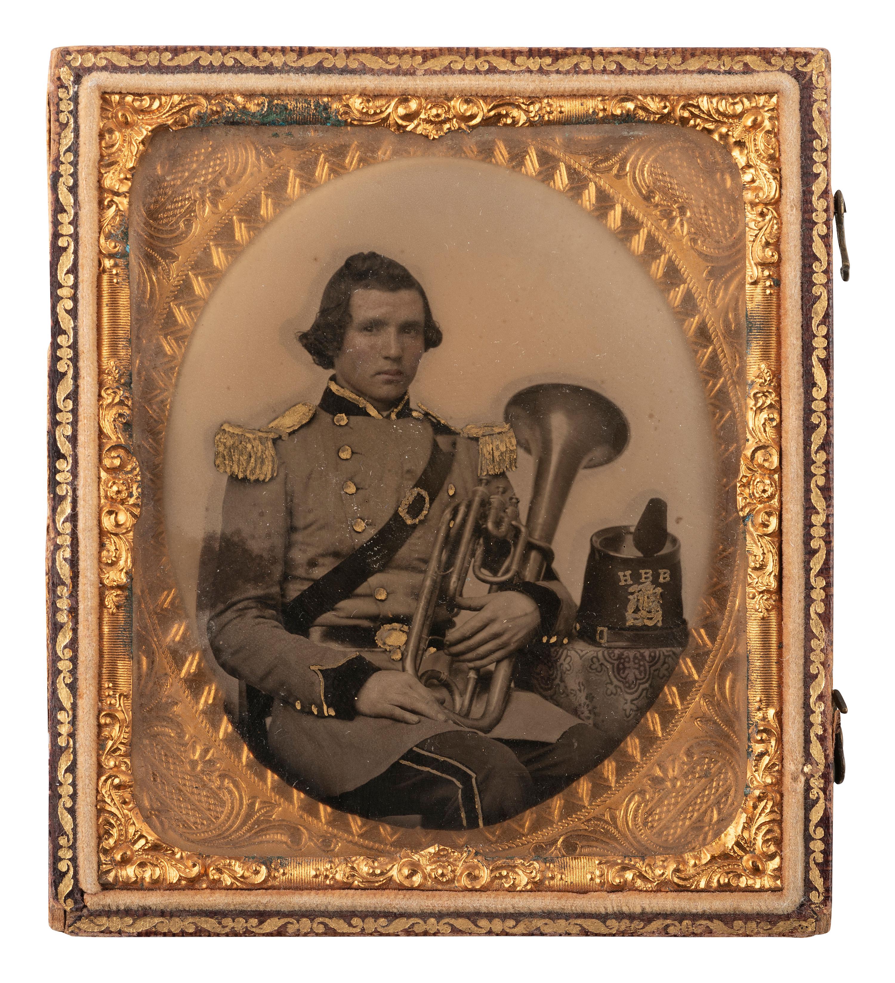 [EARLY PHOTOGRAPHY]. Sixth plate ambrotype of a brass band musician.