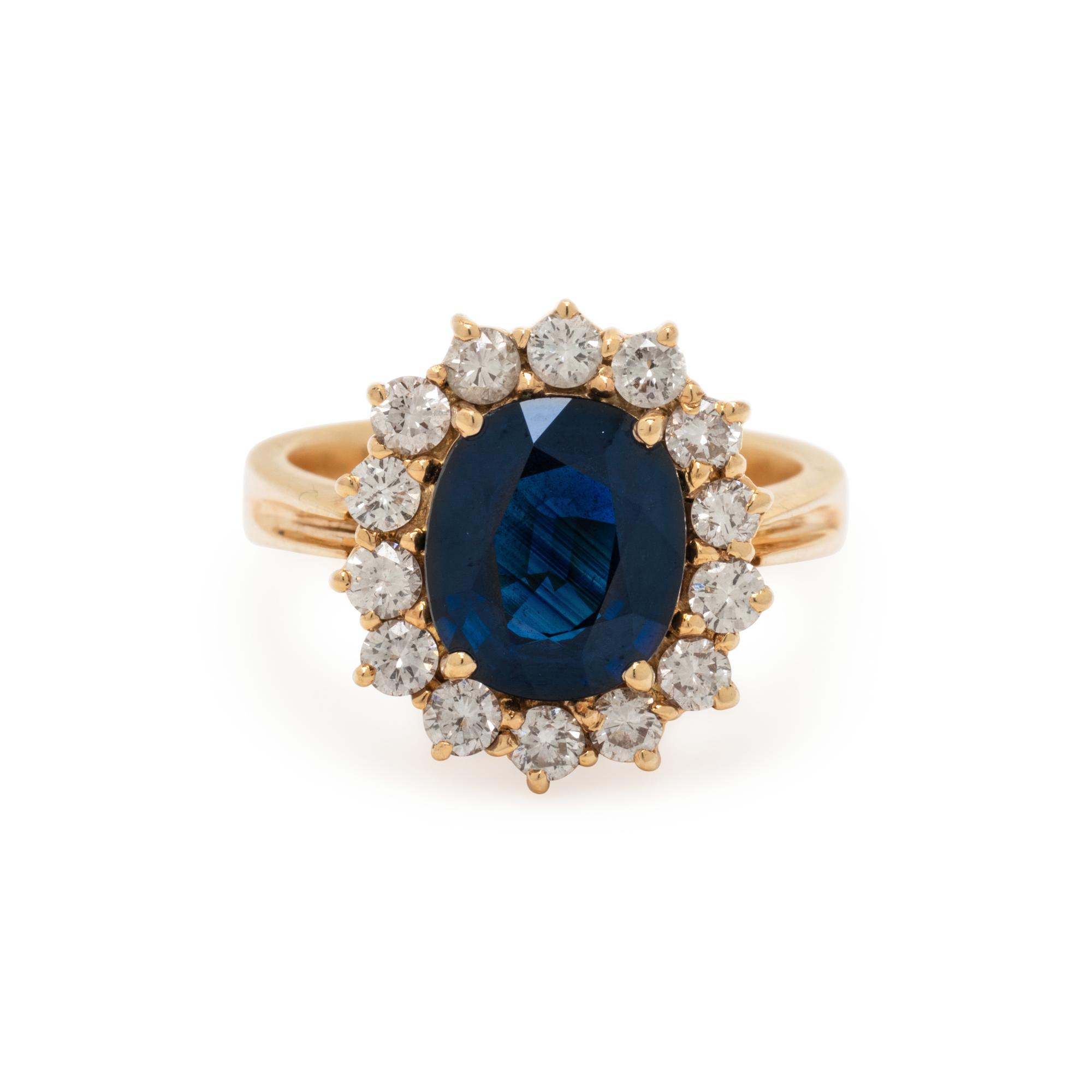 YELLOW GOLD, SAPPHIRE, AND DIAMOND RING