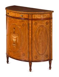 An Adam Style Satinwood and Marquetry Demilune Cabinet