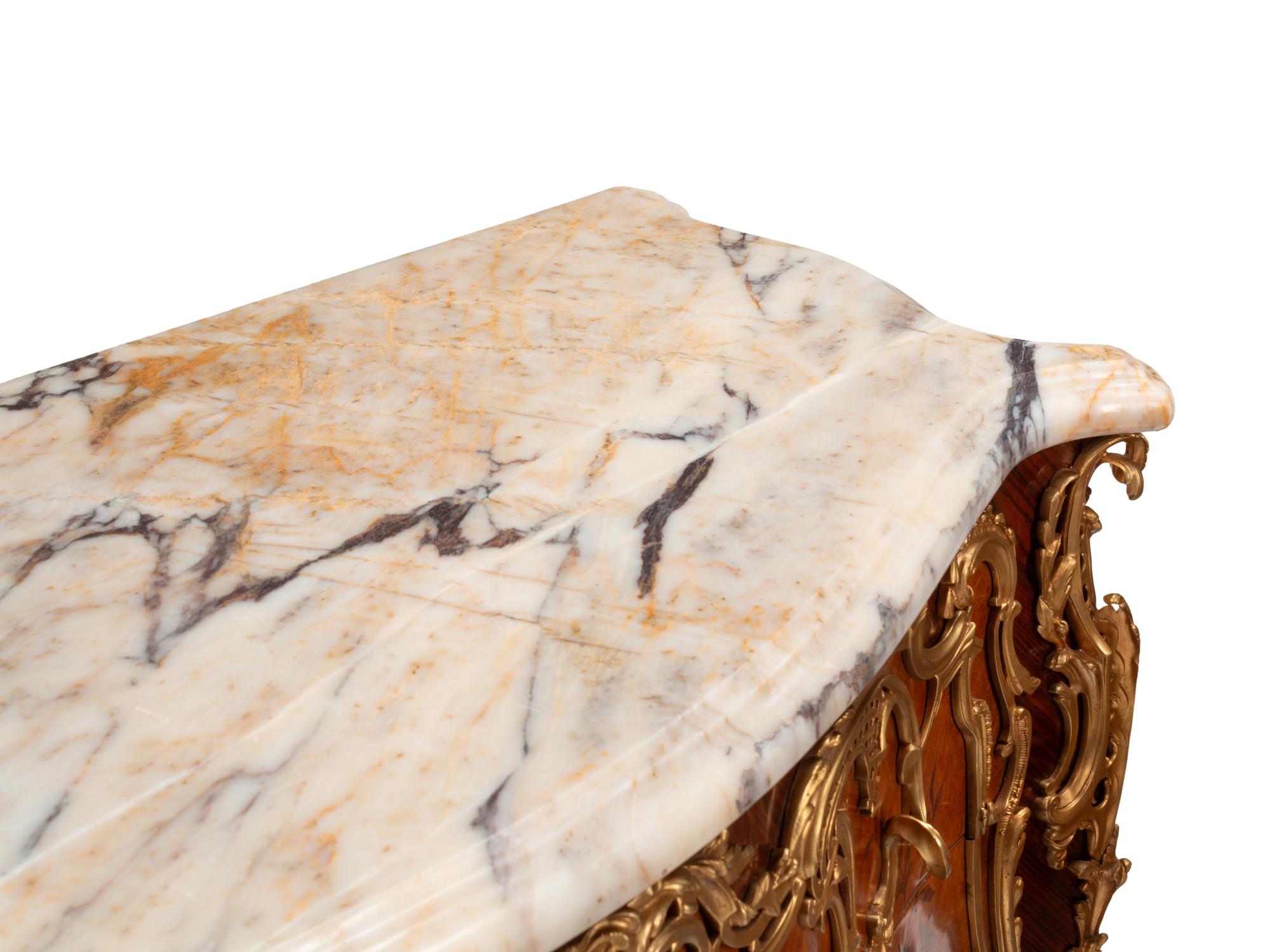 A Pair of Louis XV Style Gilt Bronze Mounted Marquetry Marble-Top Commodes