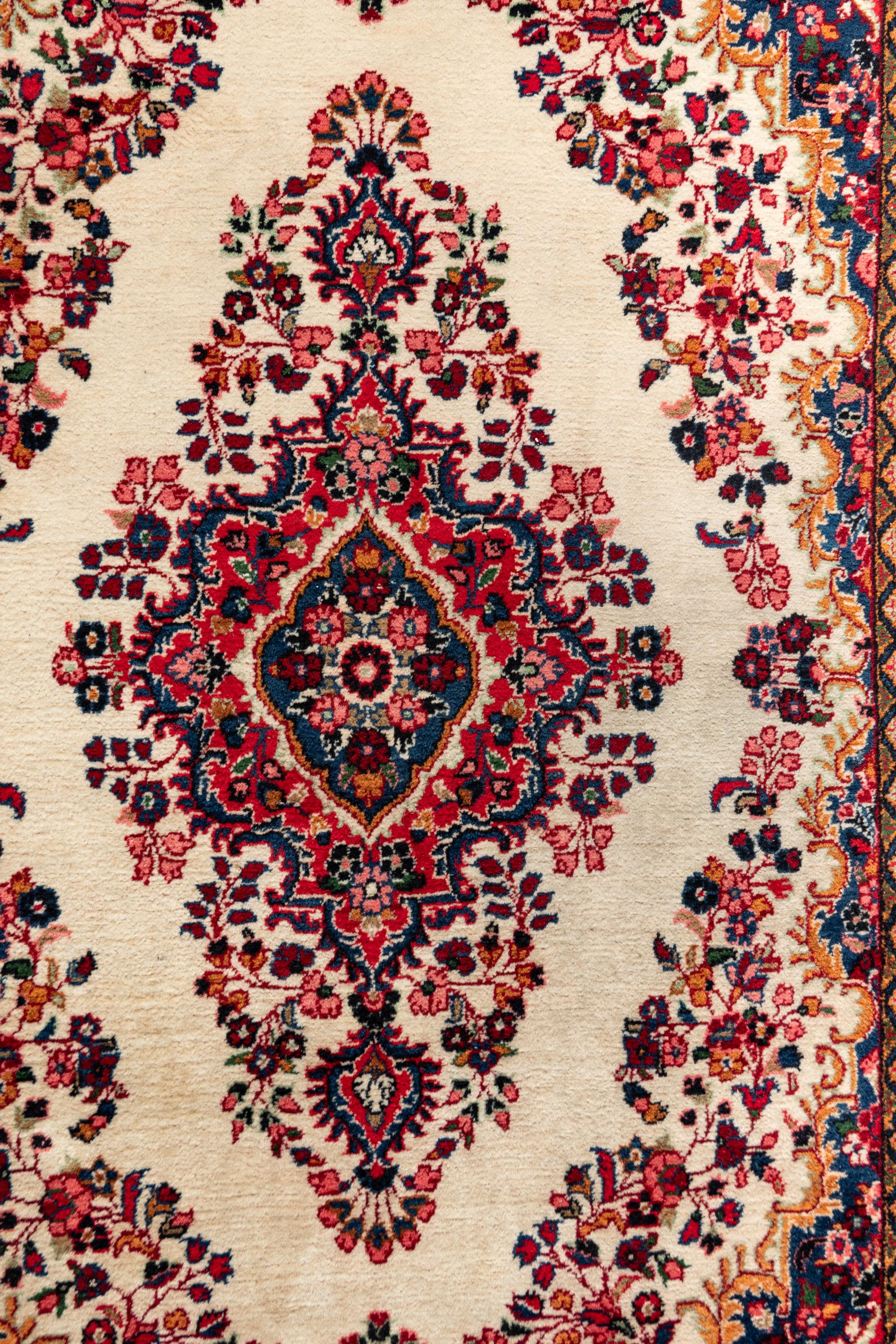 A Kirman Wool Rug