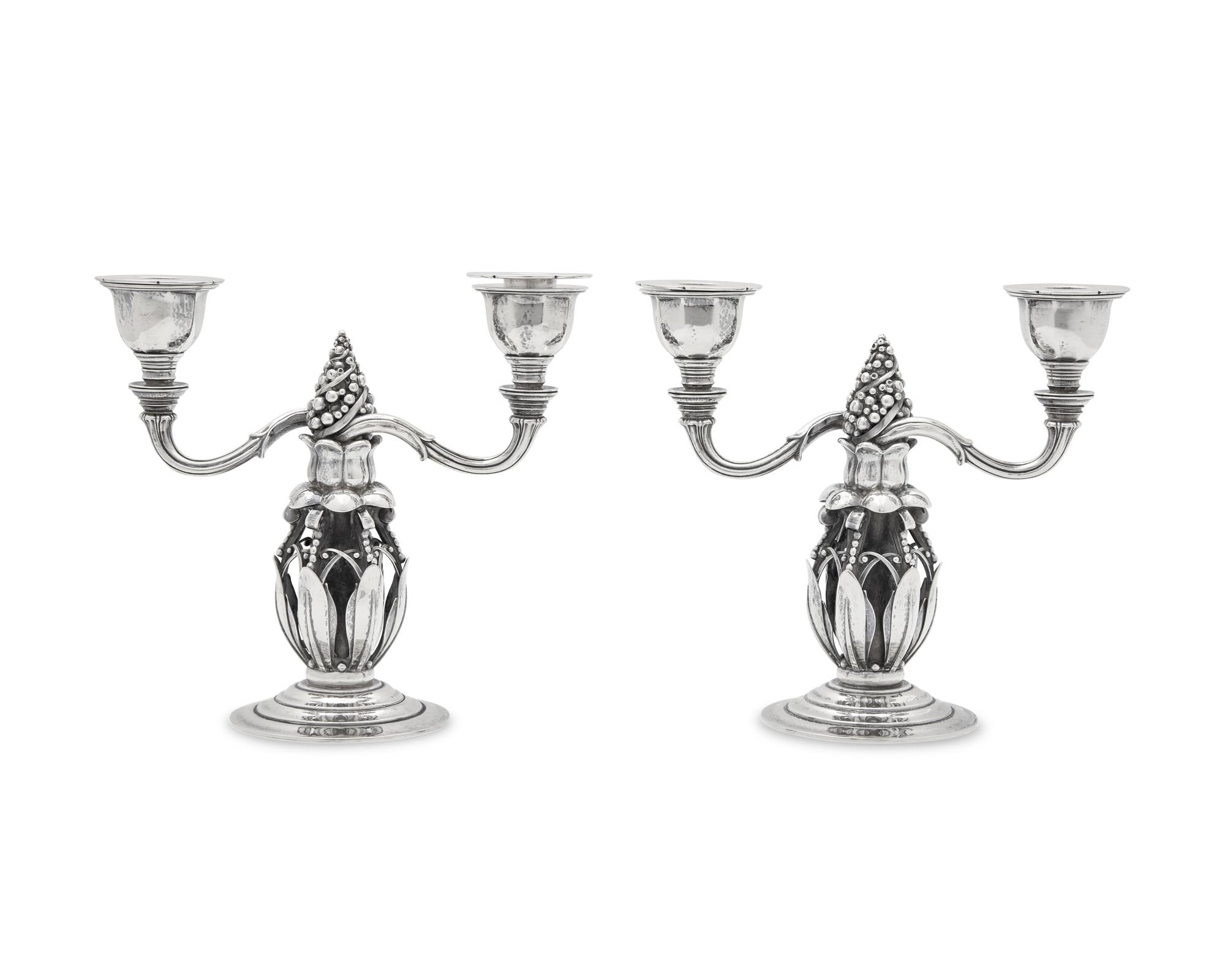 A Pair of Georg Jensen Silver Two-Light Candelabra