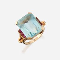 An aquamarine, ruby, and gold ring