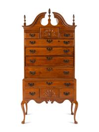 A Queen Anne Carved Walnut High Chest Of Drawers