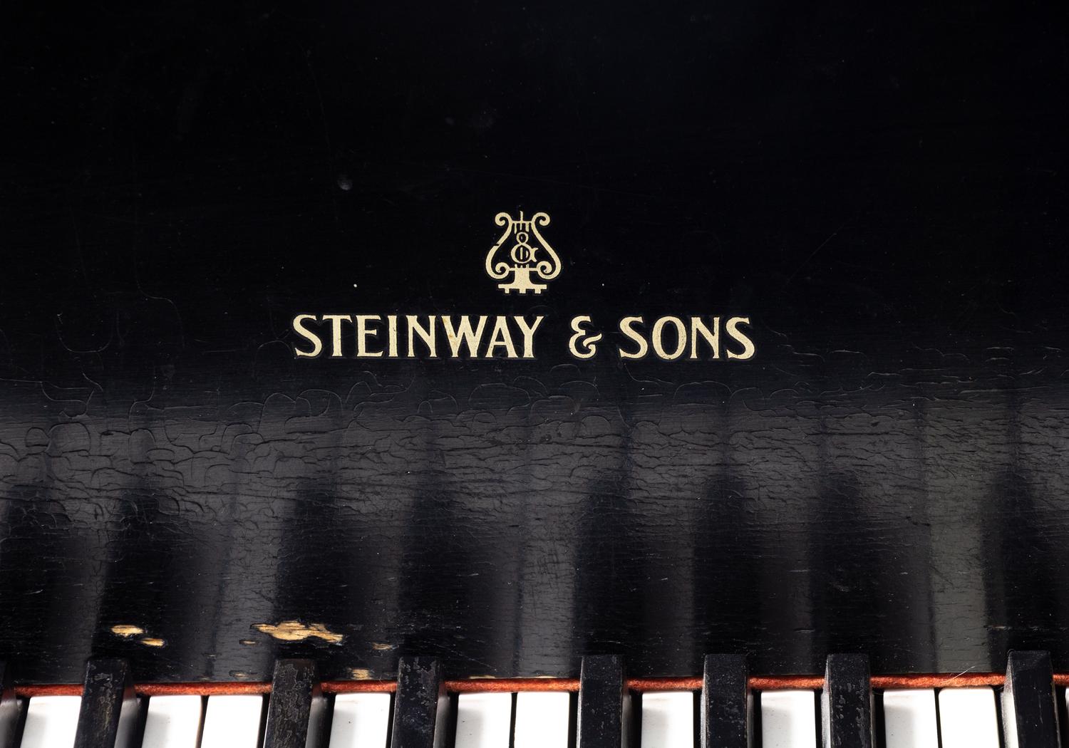 A Steinway and Sons Model L Black Lacquer Baby Grand Piano