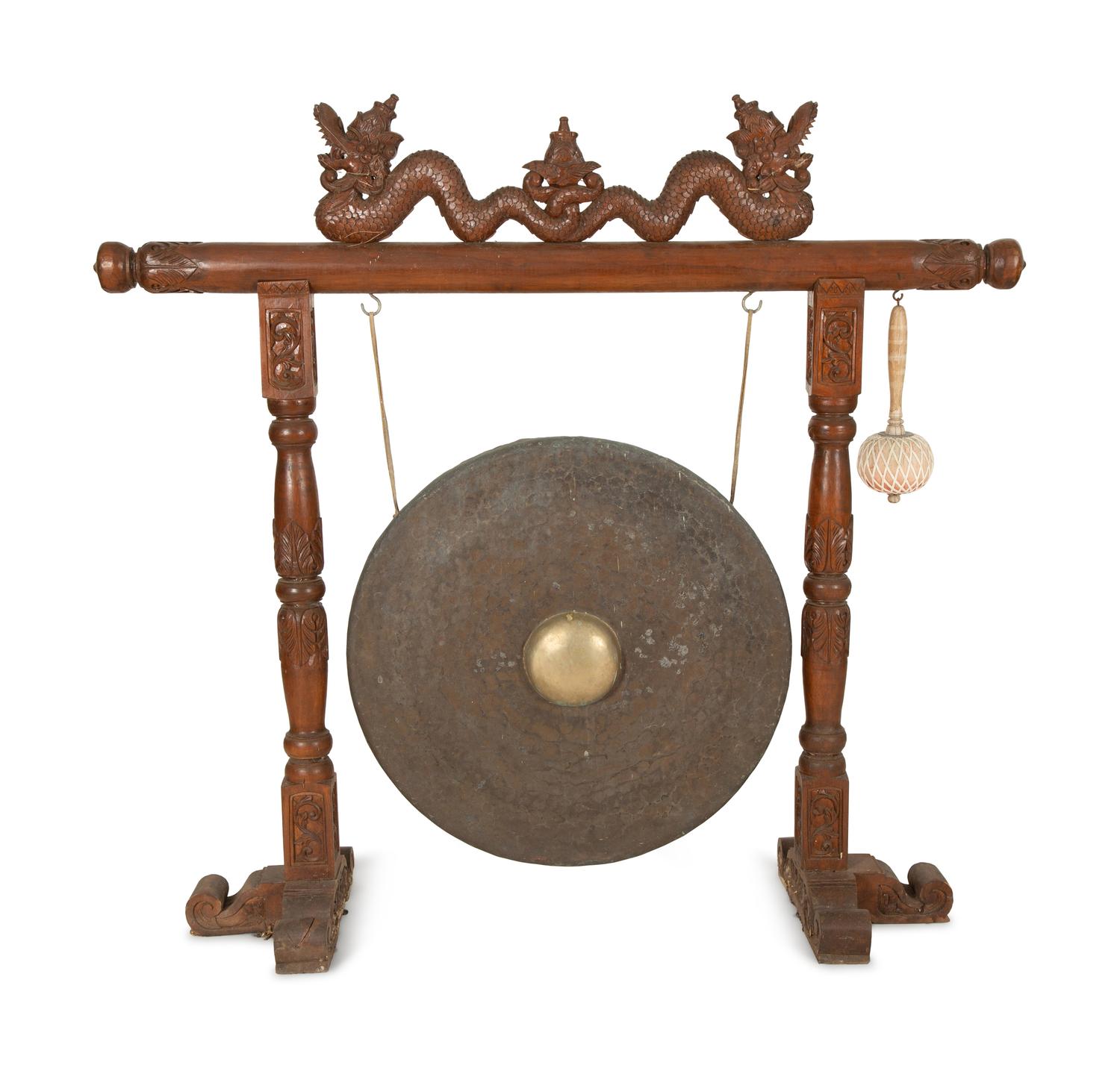 A Indonesian Gamelan Gong on Carved Wood Stand with Mallet — 19th/20th Century