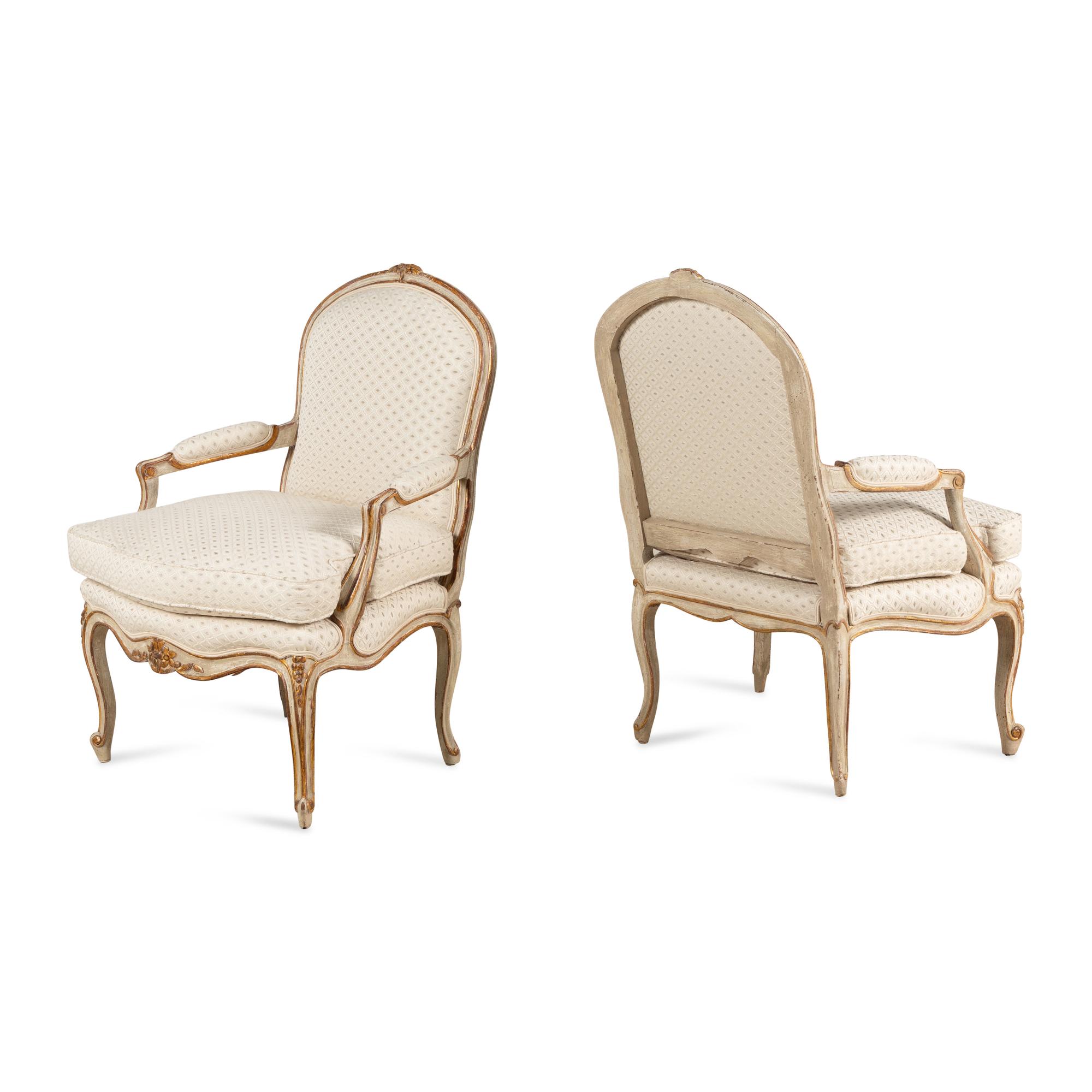 A Pair of Louis XV Style Painted and Parcel Gilt Fauteuils
