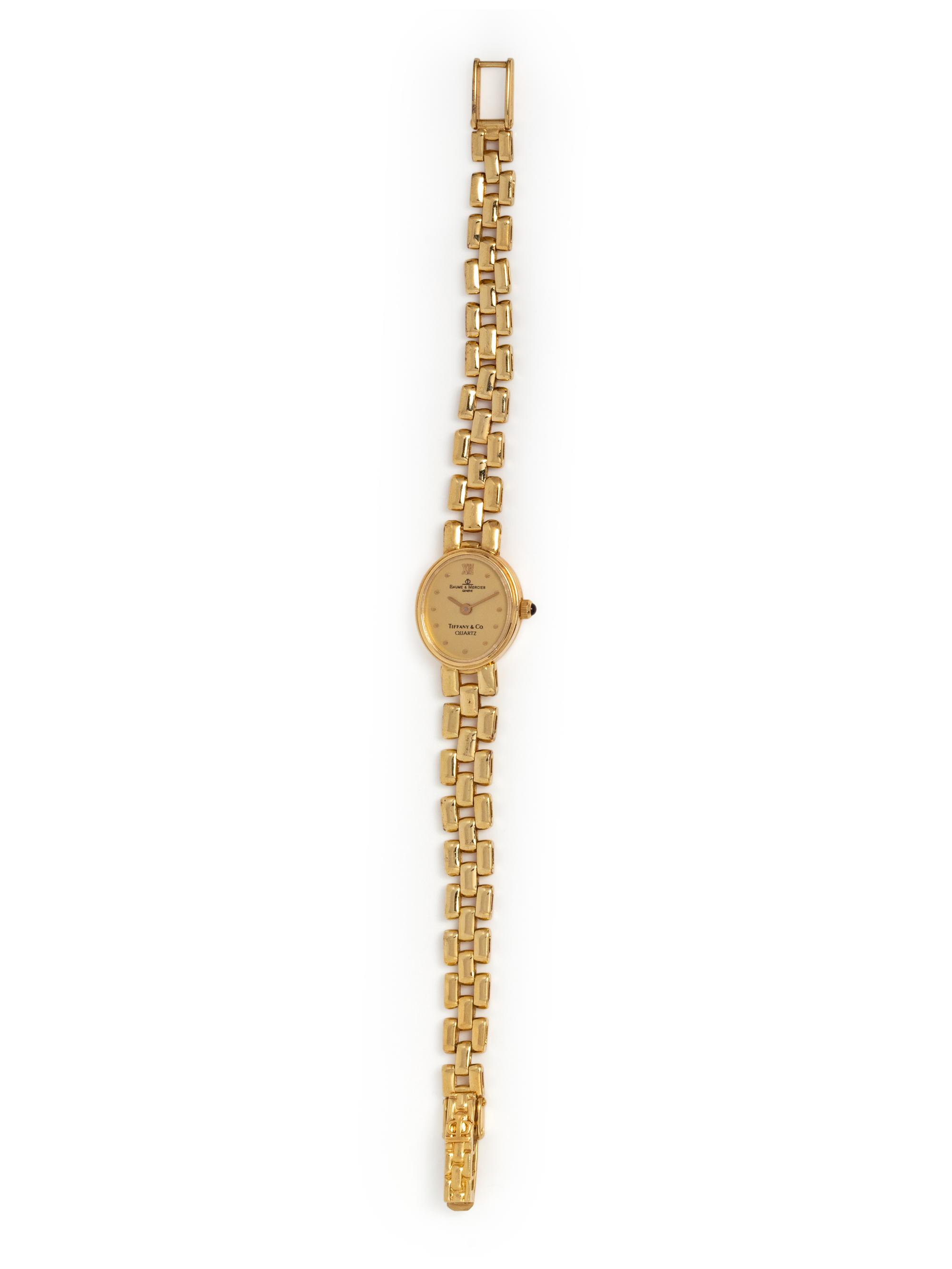 TIFFANY & CO., BAUME & MERCIER, 14K YELLOW GOLD WRISTWATCH