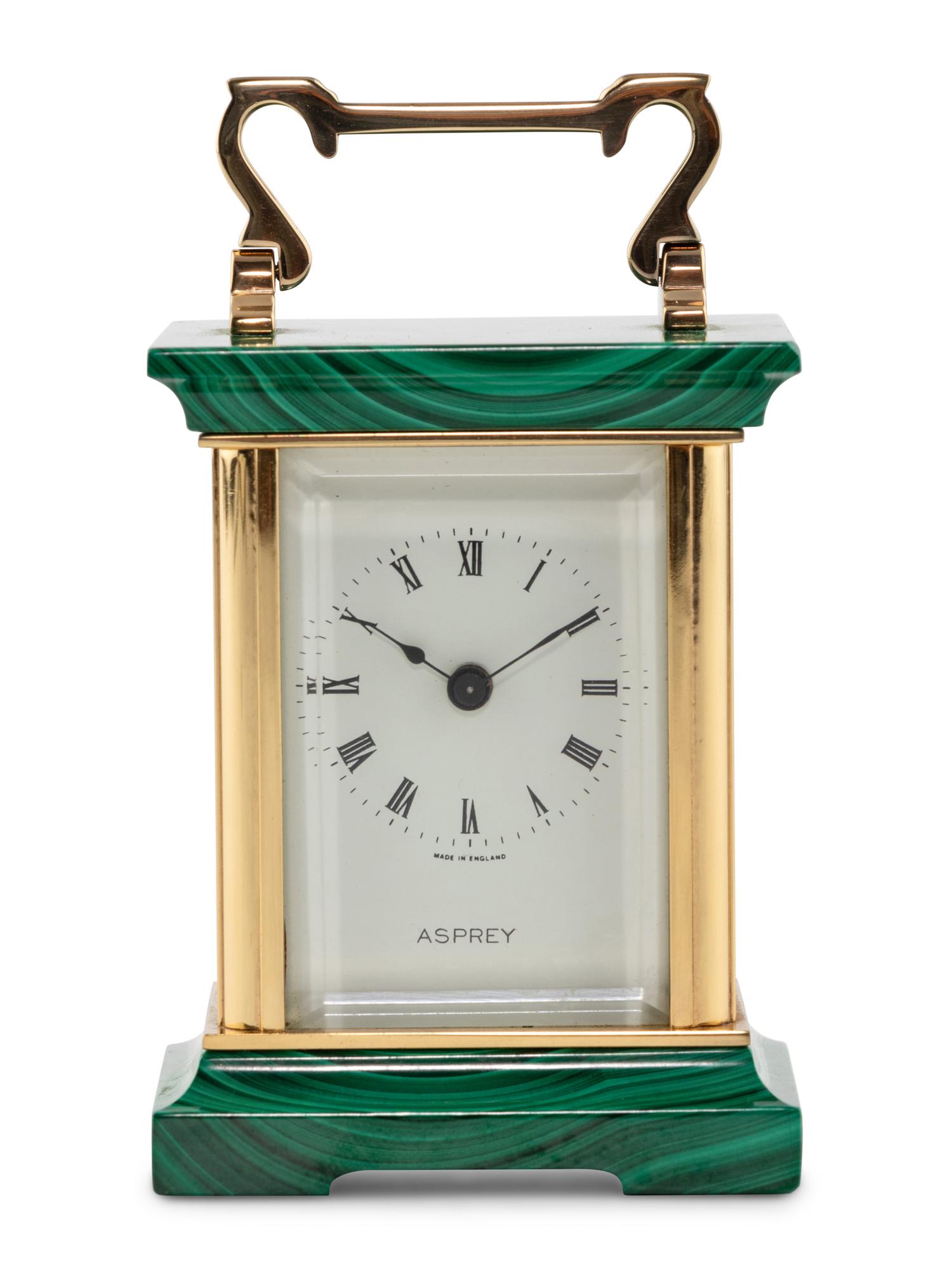 An Asprey and Co. Malachite and Brass Carriage Clock
