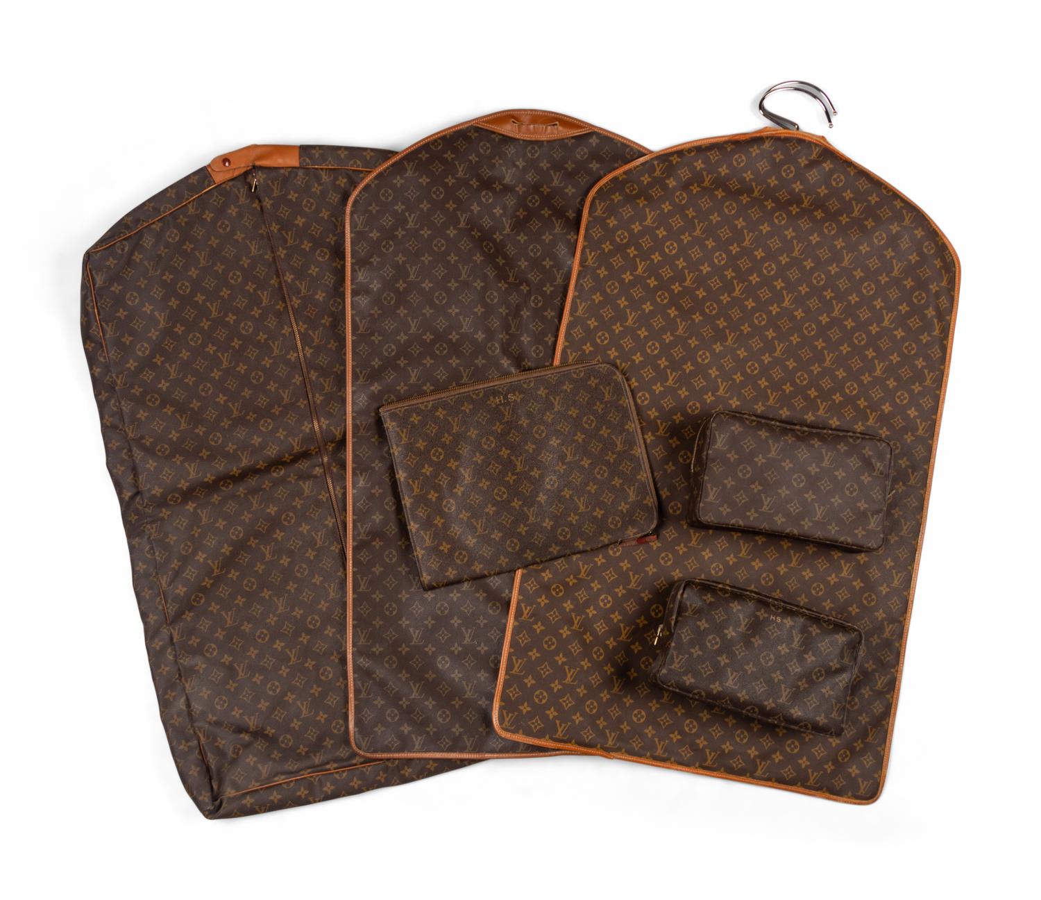 A Collection of Six Louis Vuitton Travel Accessories