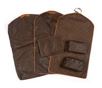 A Collection of Six Louis Vuitton Travel Accessories