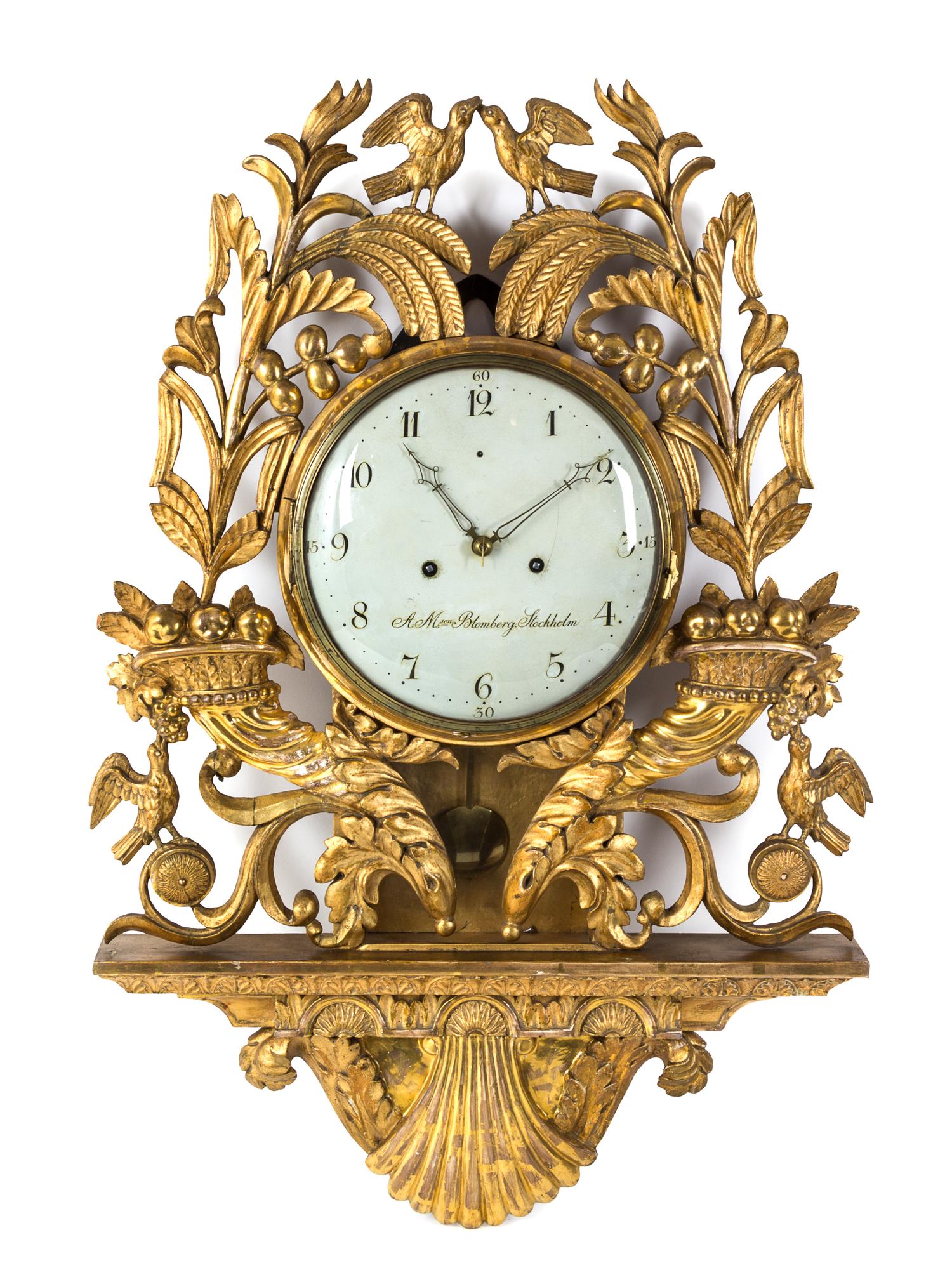 A Swedish Giltwood Cartel Clock Height 35 inches. — A.M. BLOMBERG, LATE 18TH CENTURY