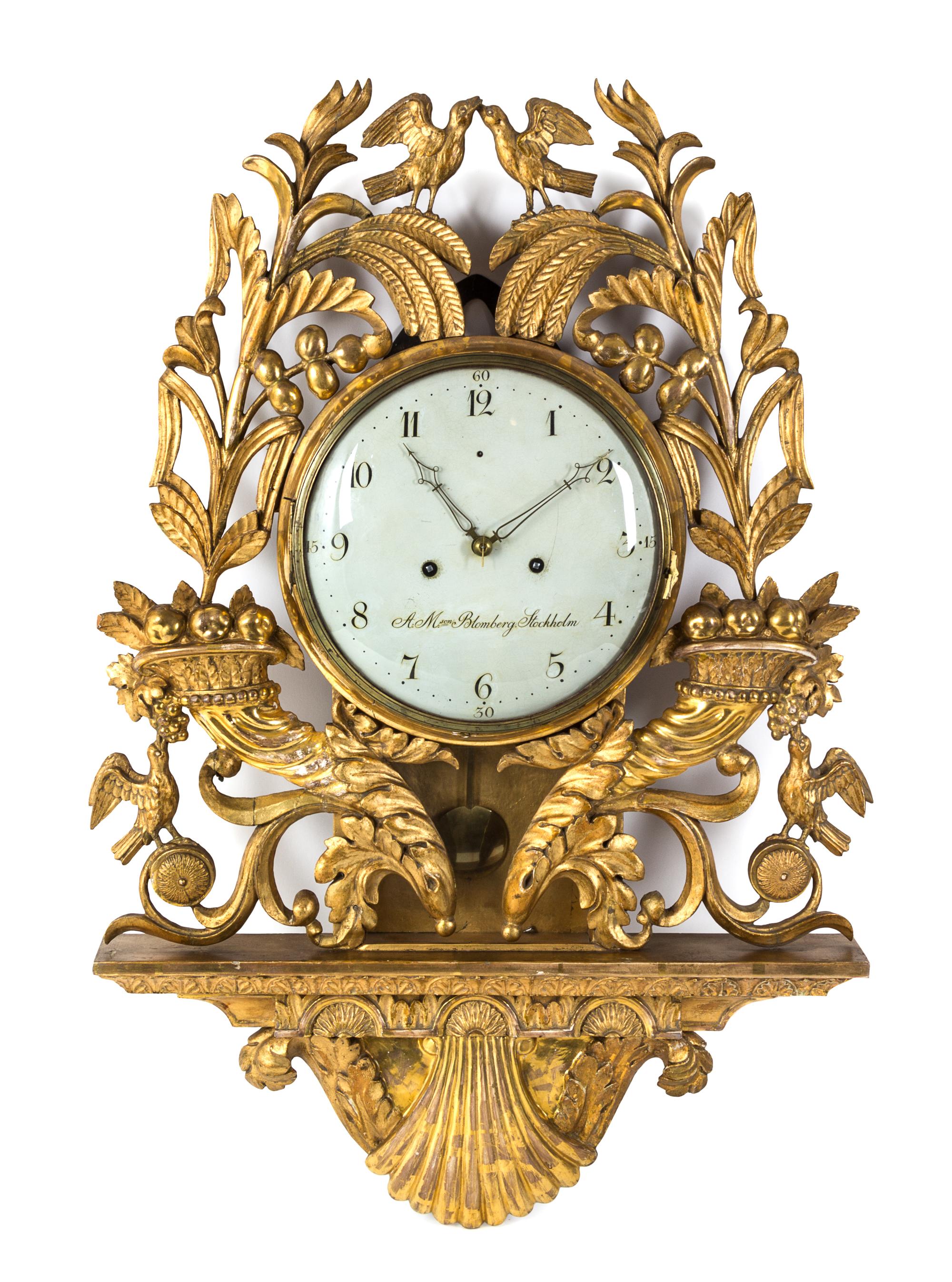 A Swedish Giltwood Cartel Clock Height 35 inches. — A.M. BLOMBERG, LATE 18TH CENTURY