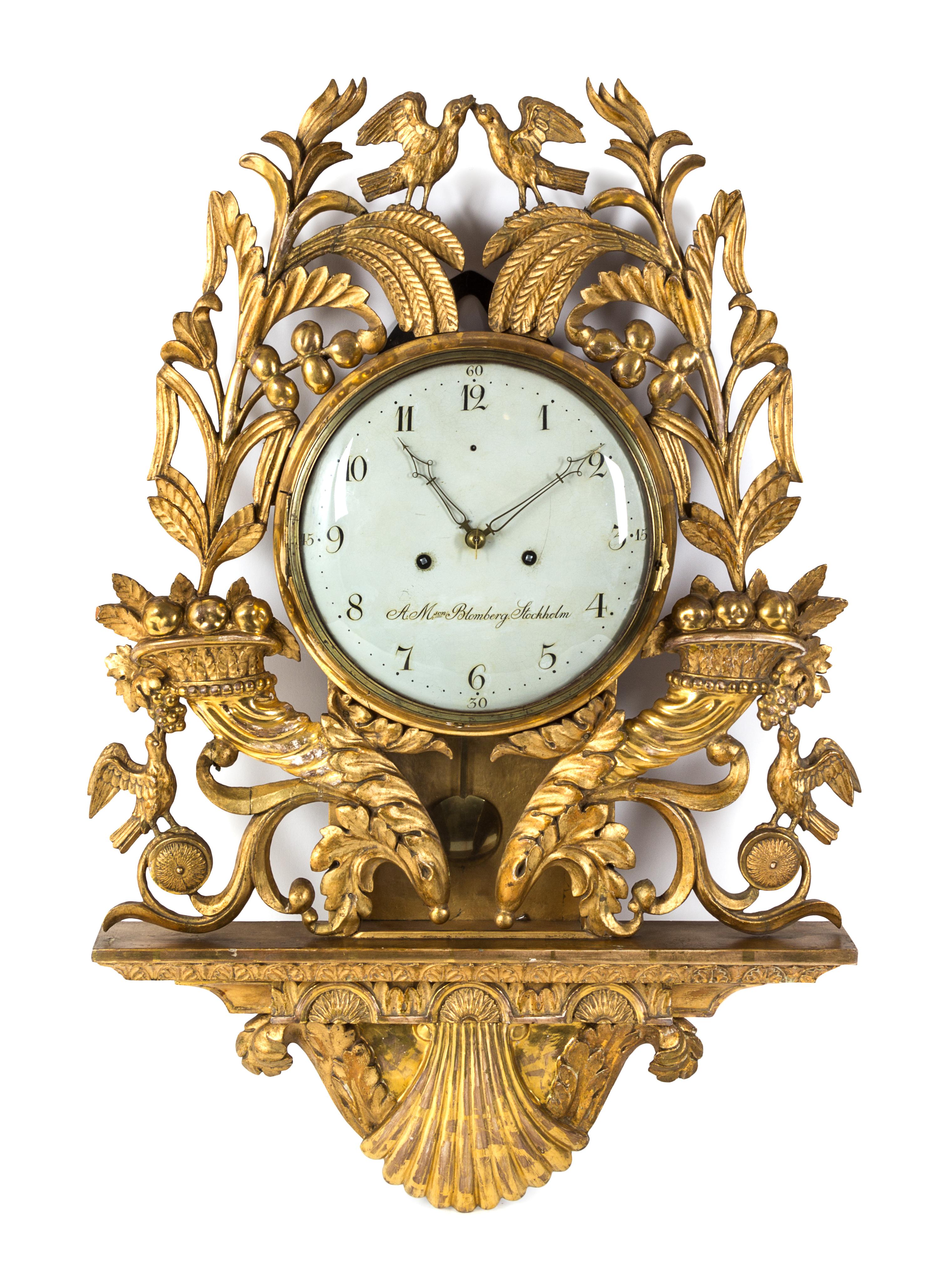 A Swedish Giltwood Cartel Clock Height 35 inches. — A.M. BLOMBERG, LATE 18TH CENTURY